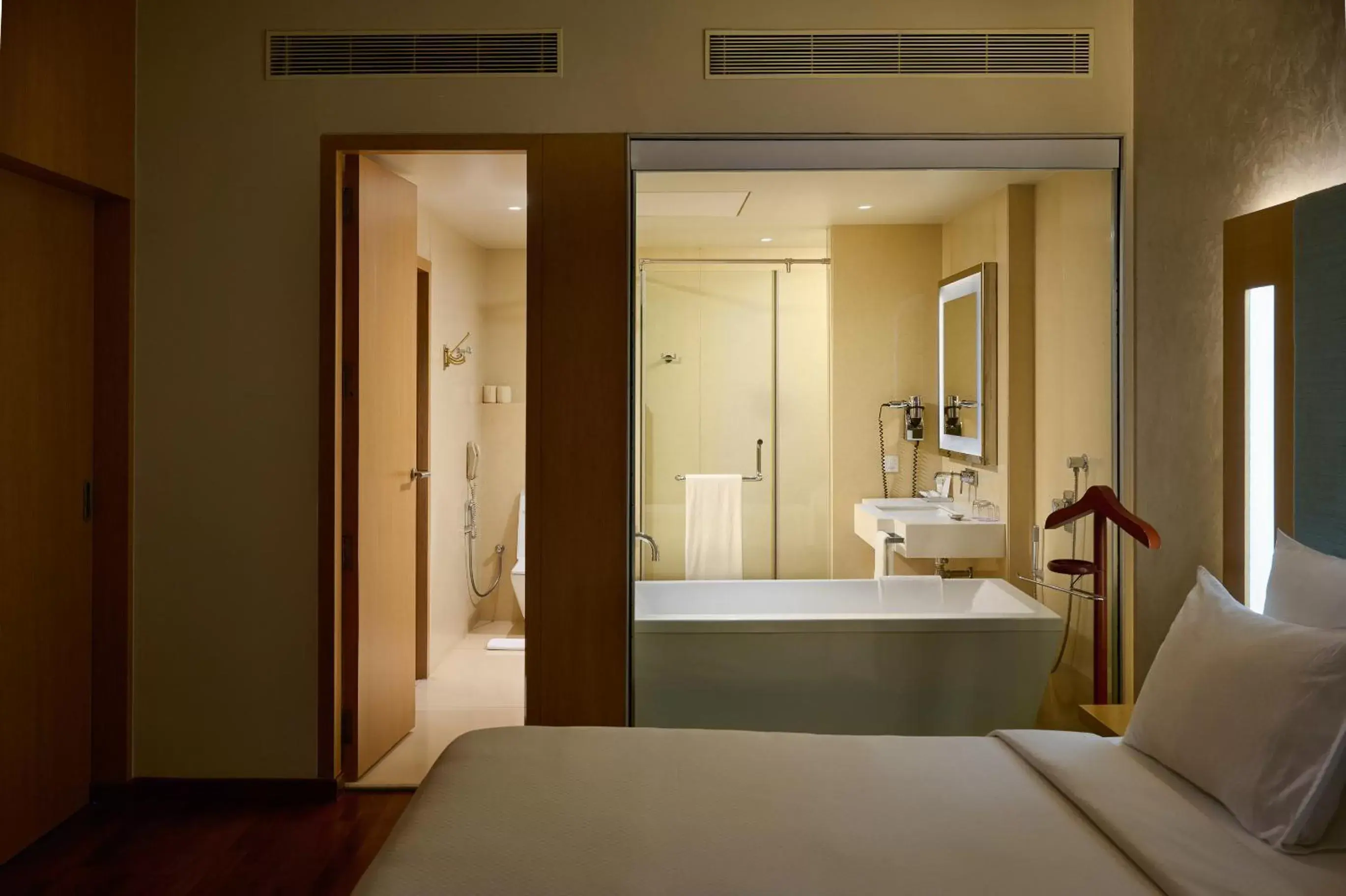 Bathroom, Bed in Novotel Visakhapatnam Varun Beach