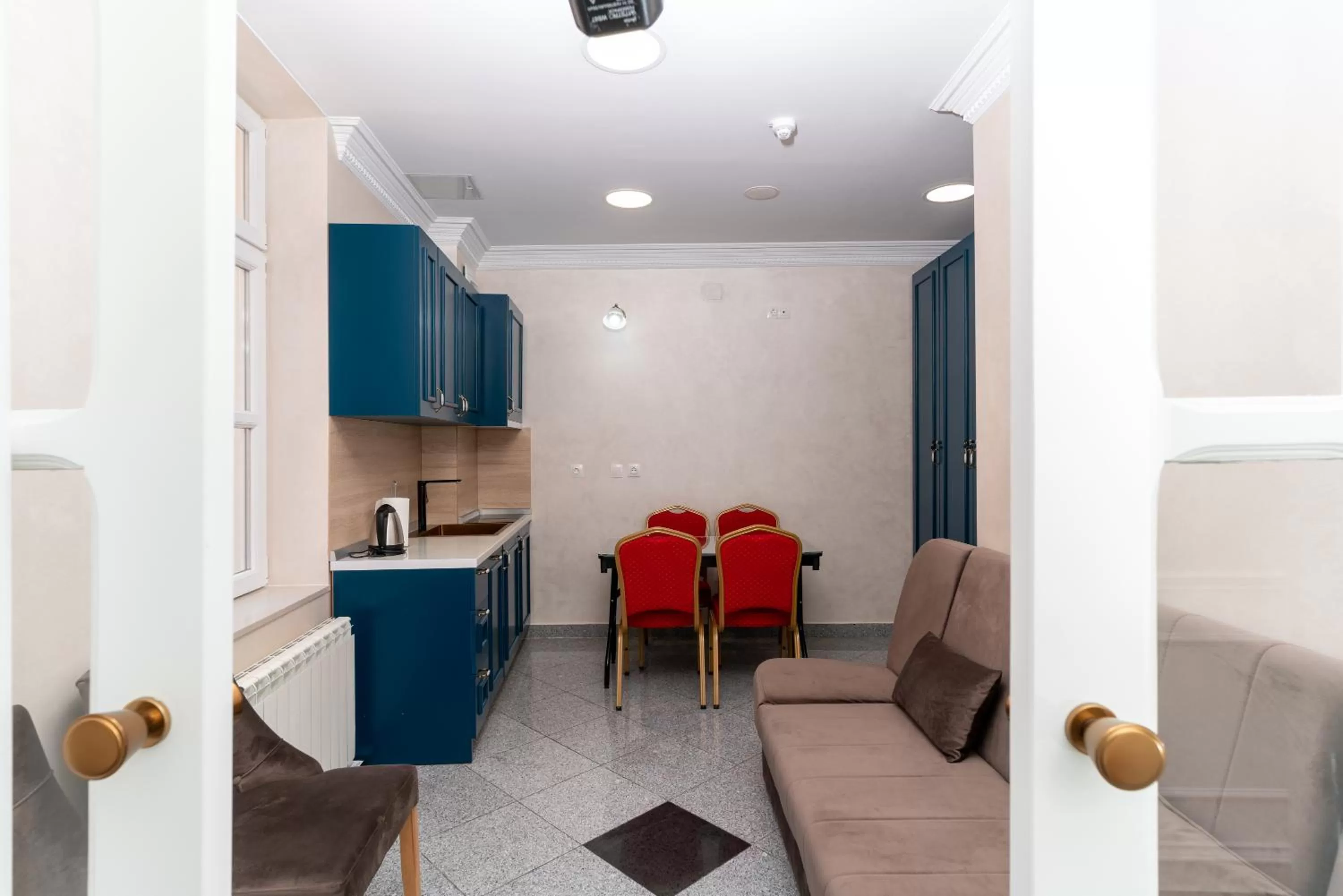 Kitchen or kitchenette in Ornament Hotel