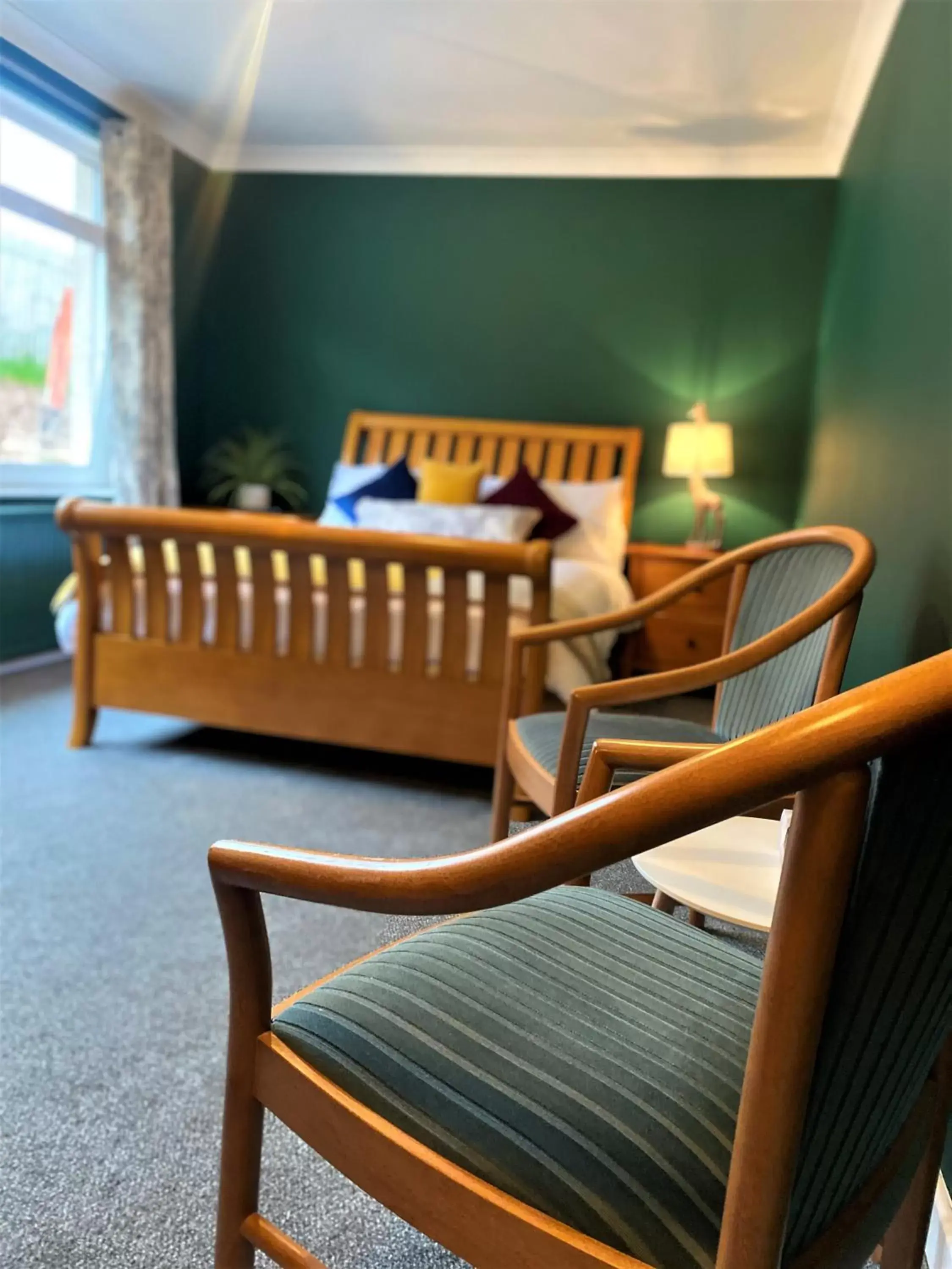 Bedroom, Seating Area in The 1645 Inn