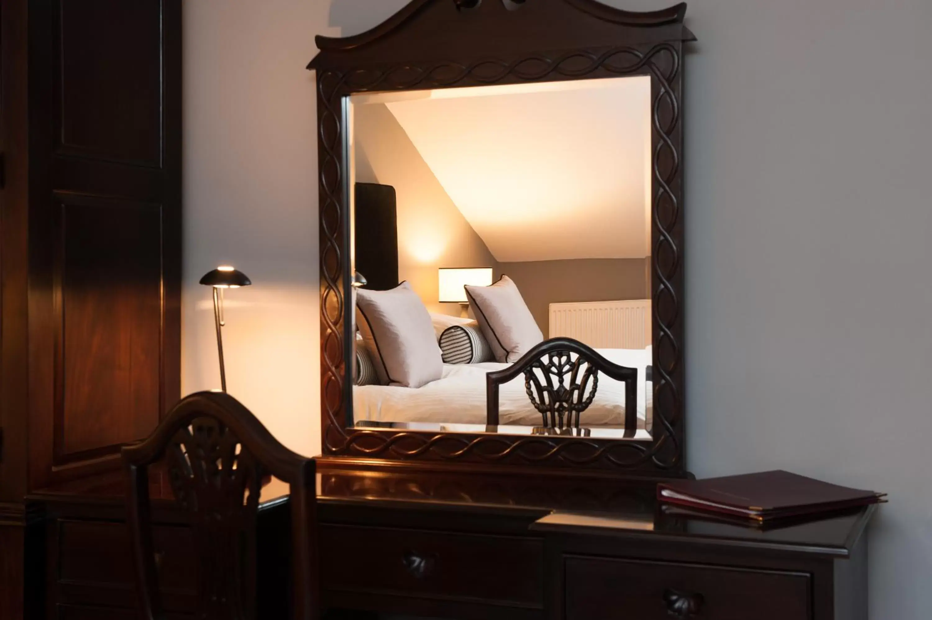 Bed, Seating Area in No. 11 Boutique Hotel & Brasserie