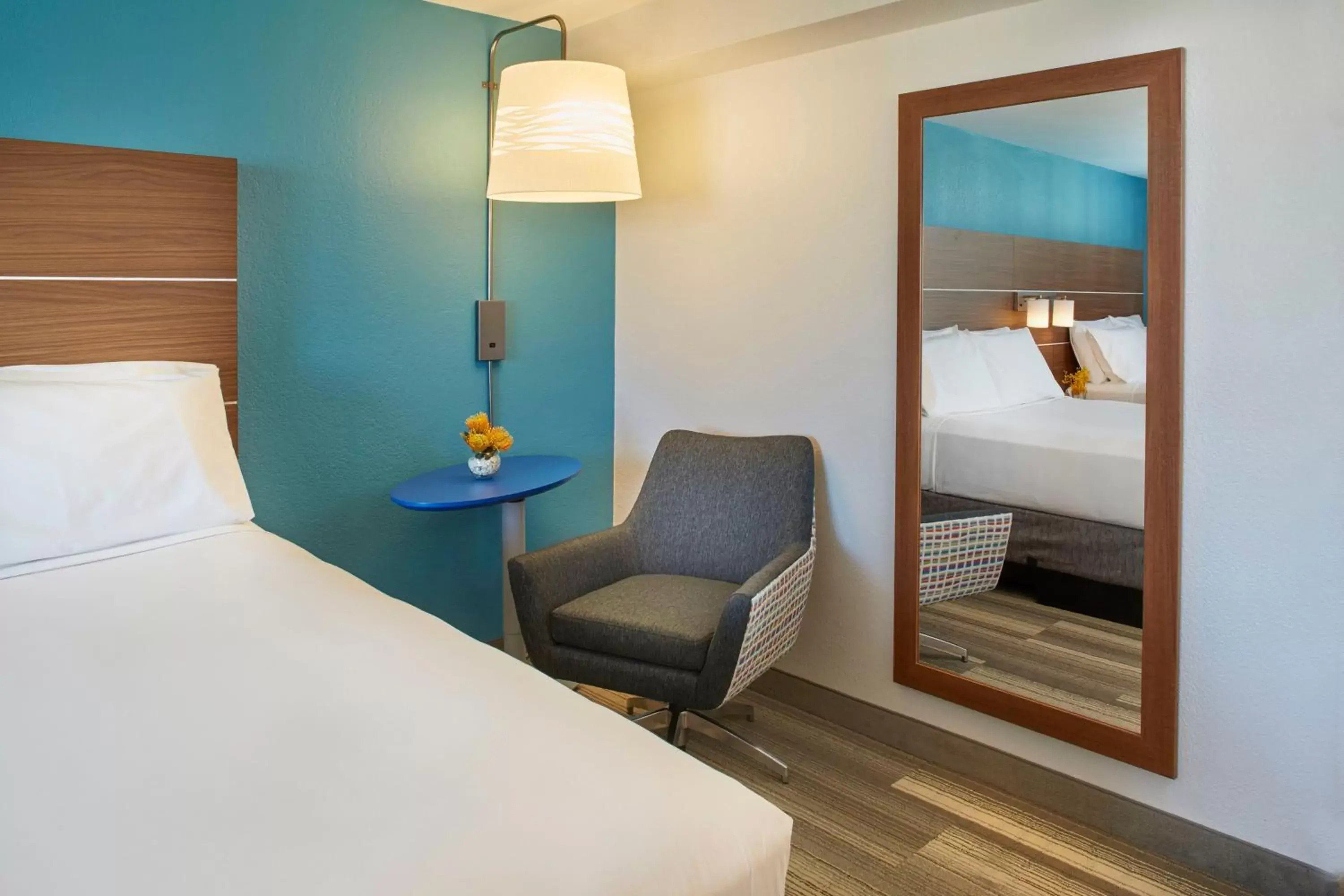Bed, Seating Area in Holiday Inn Express Waikiki, an IHG Hotel
