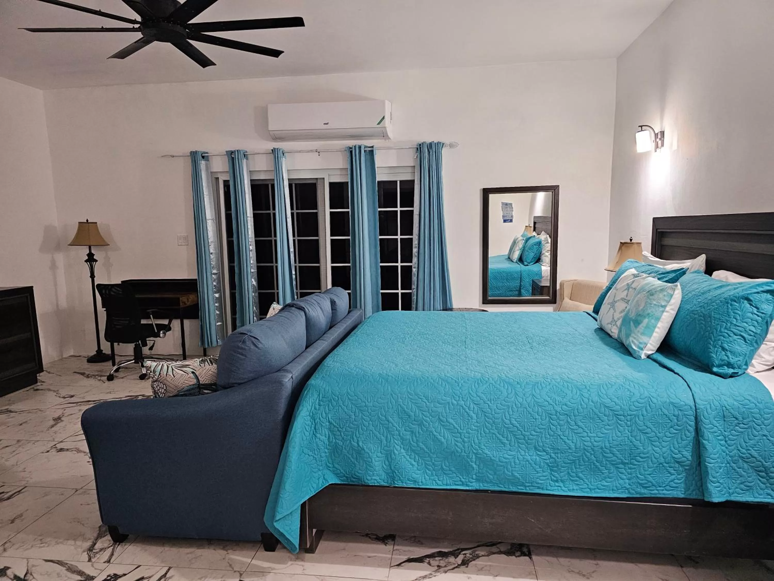 Bed in Roots Cafe Rooms