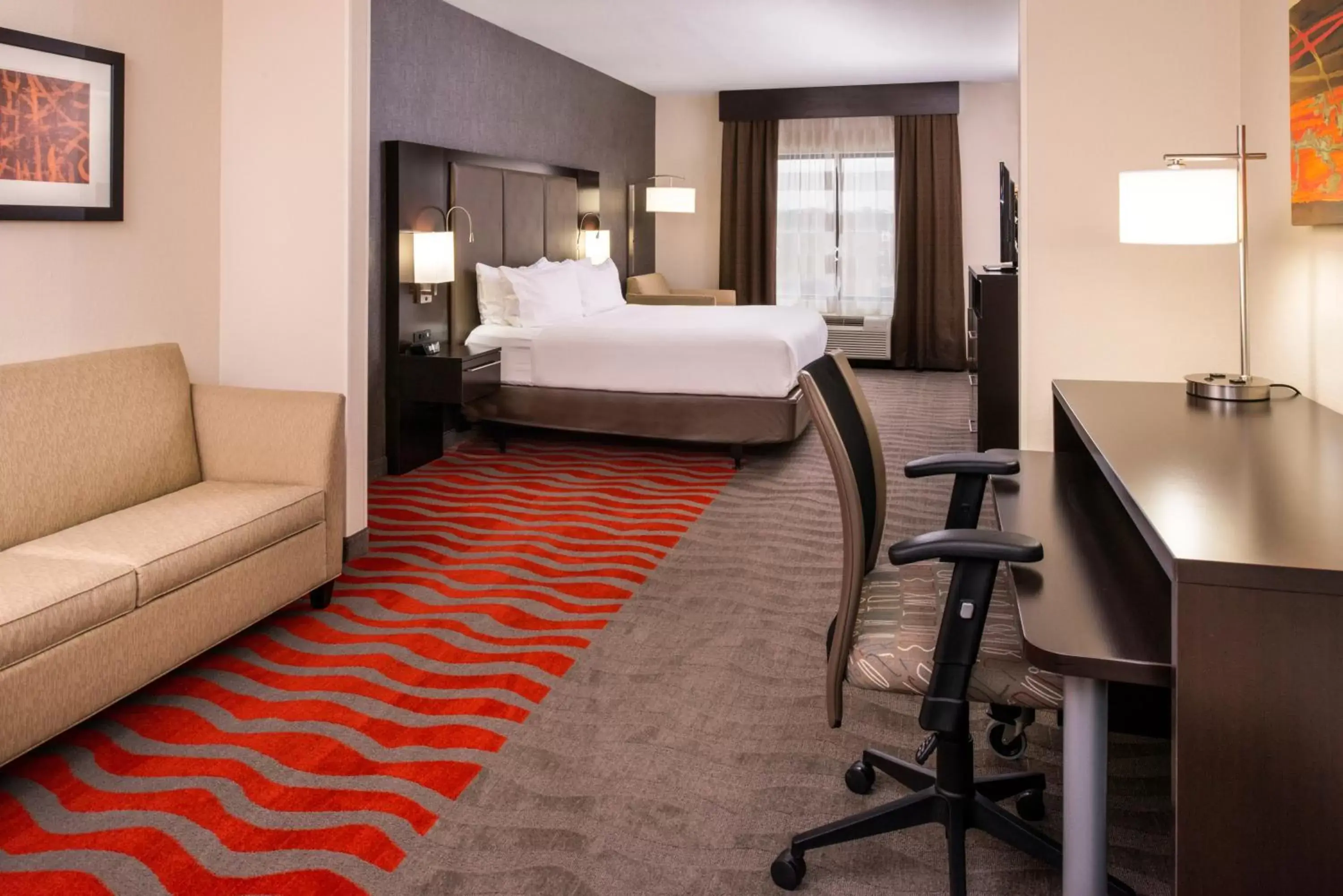 Bedroom in Holiday Inn Express & Suites Monroe, an IHG Hotel