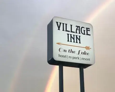Property logo or sign in Village Inn on the Lake