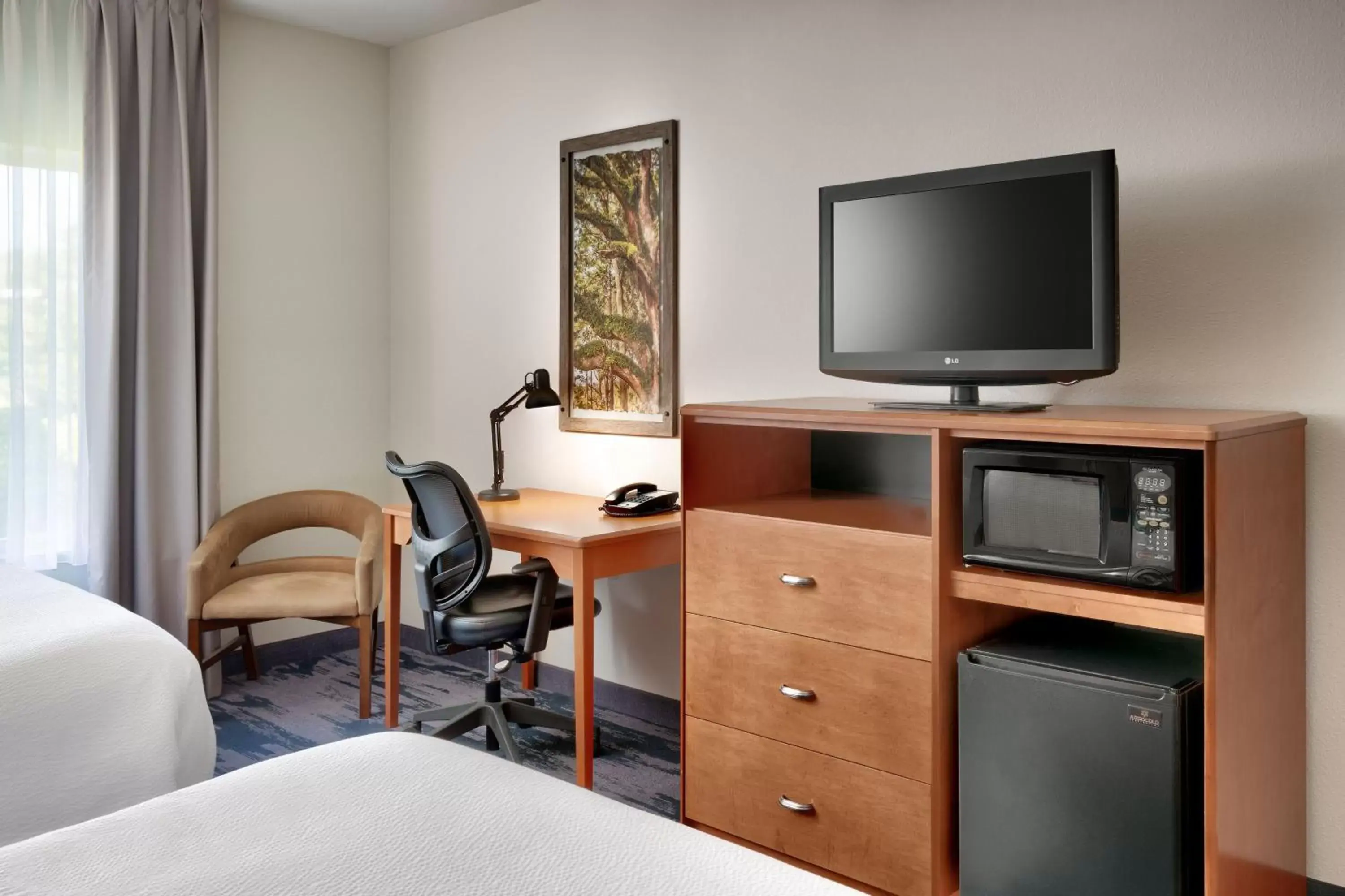 Photo of the whole room, TV/Entertainment Center in Fairfield Inn & Suites by Marriott Tallahassee Central