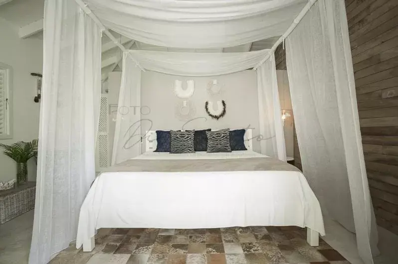 Bed in Mahona Boutique Hotel