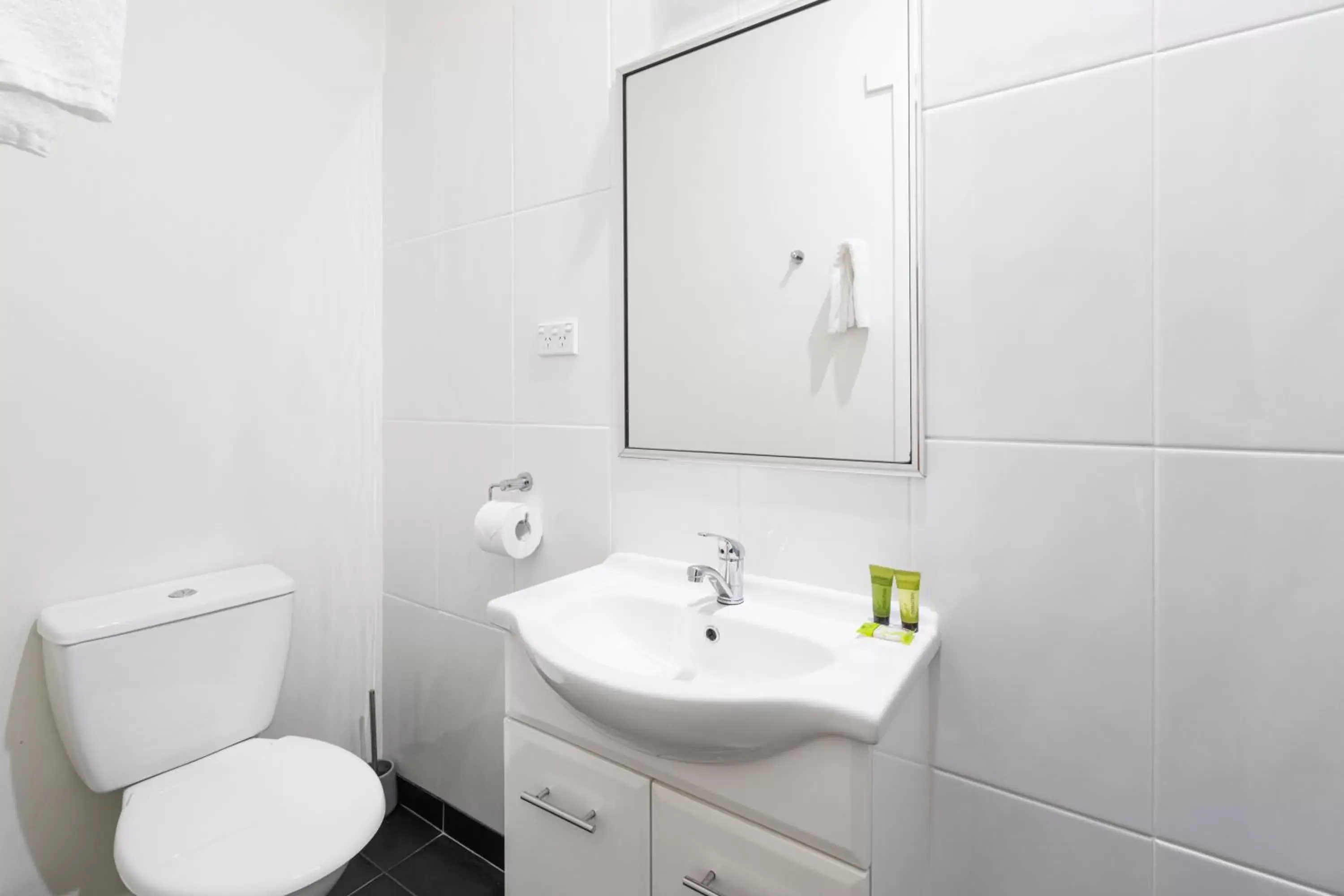 Toilet, Bathroom in Graham Apartments