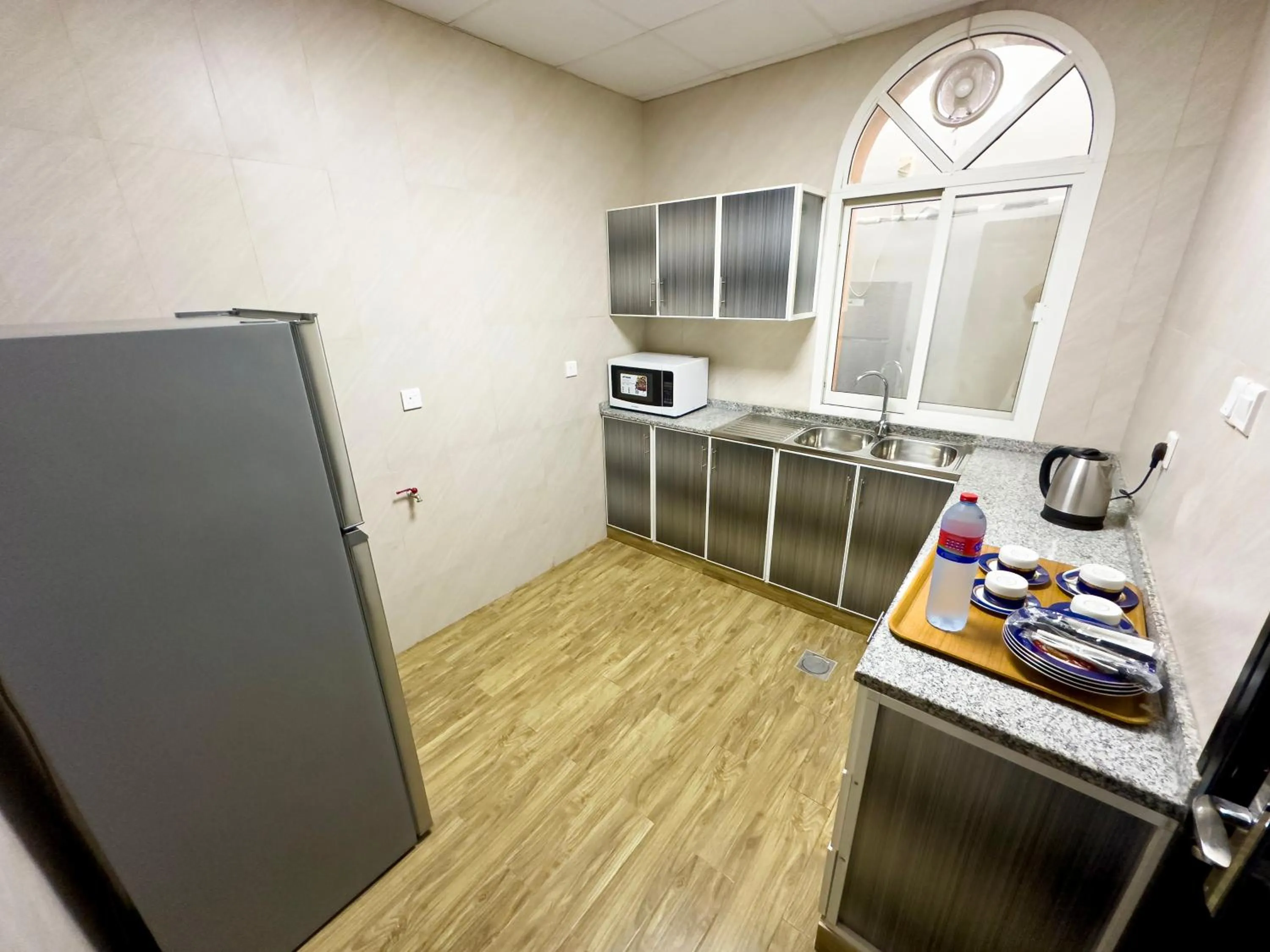 Kitchen or kitchenette in Royal Residence Hotel Apartments