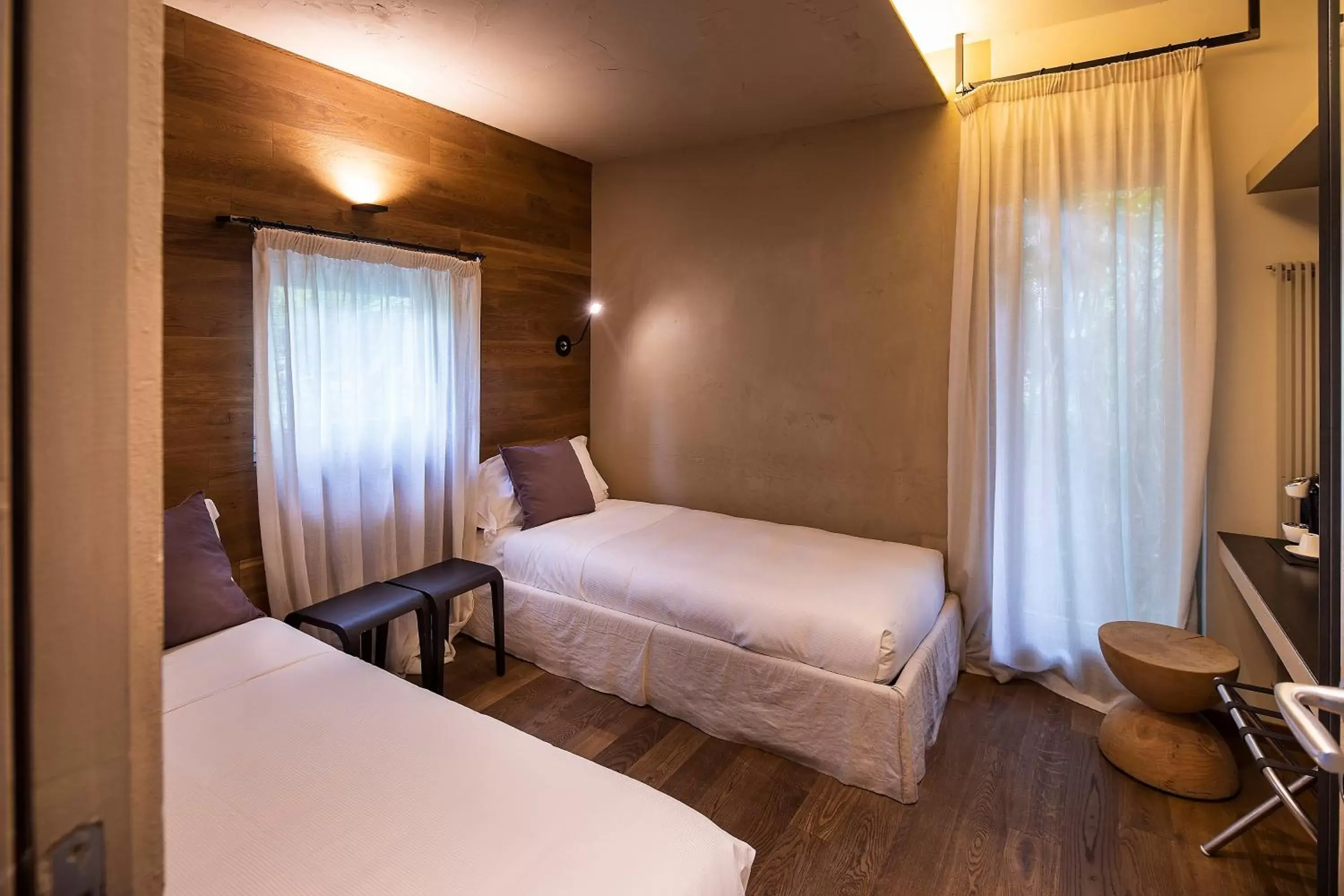 Bed in Donna Carmela Resort & Lodges