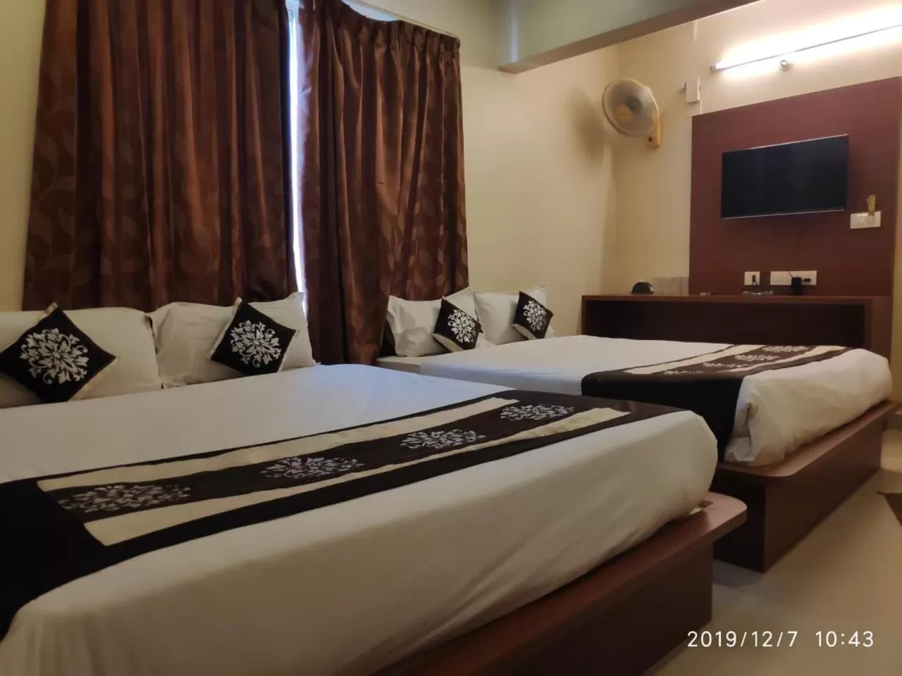 Photo of the whole room, Bed in The Grand Inn Mysore