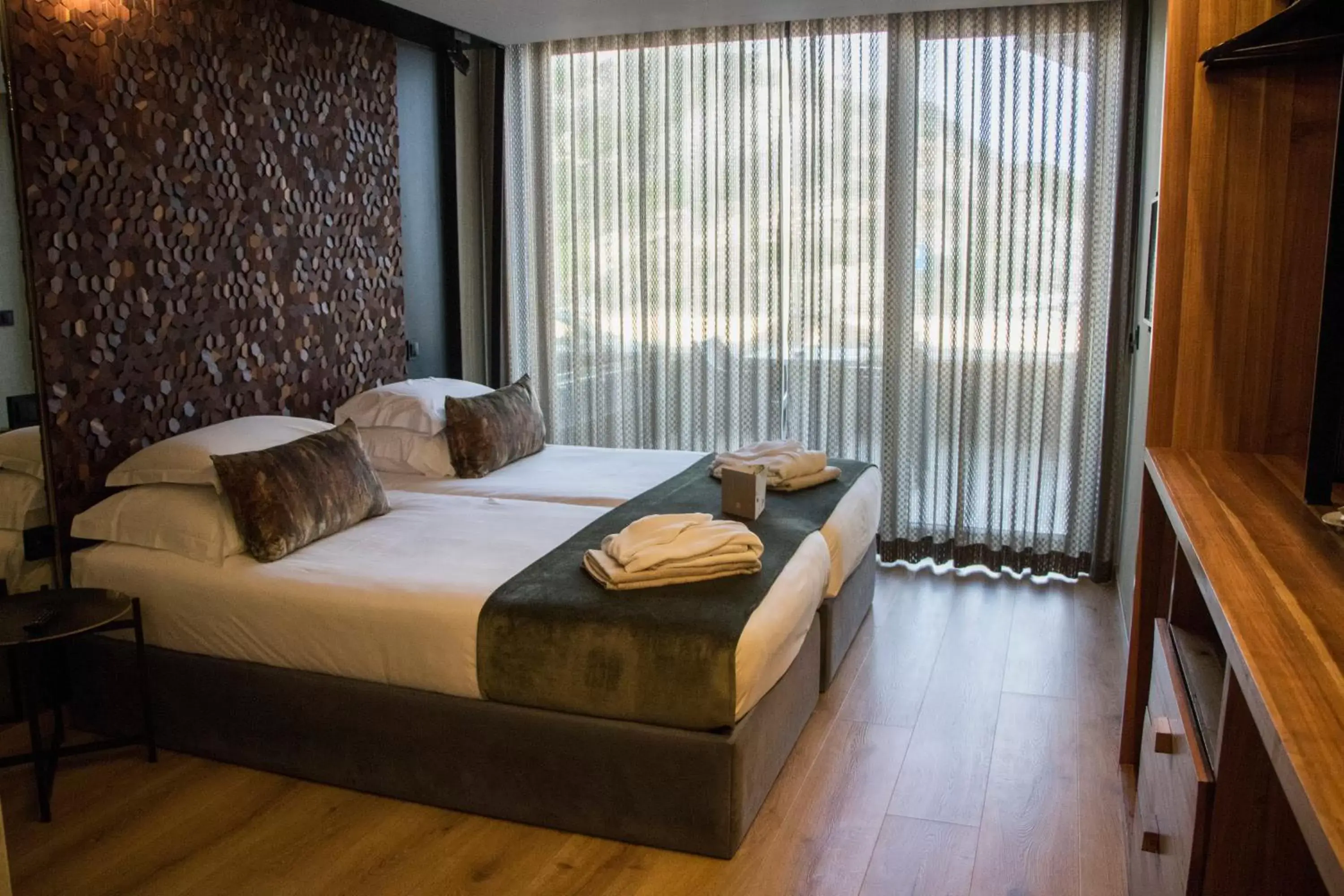 Bed in Well Hotel & Spa