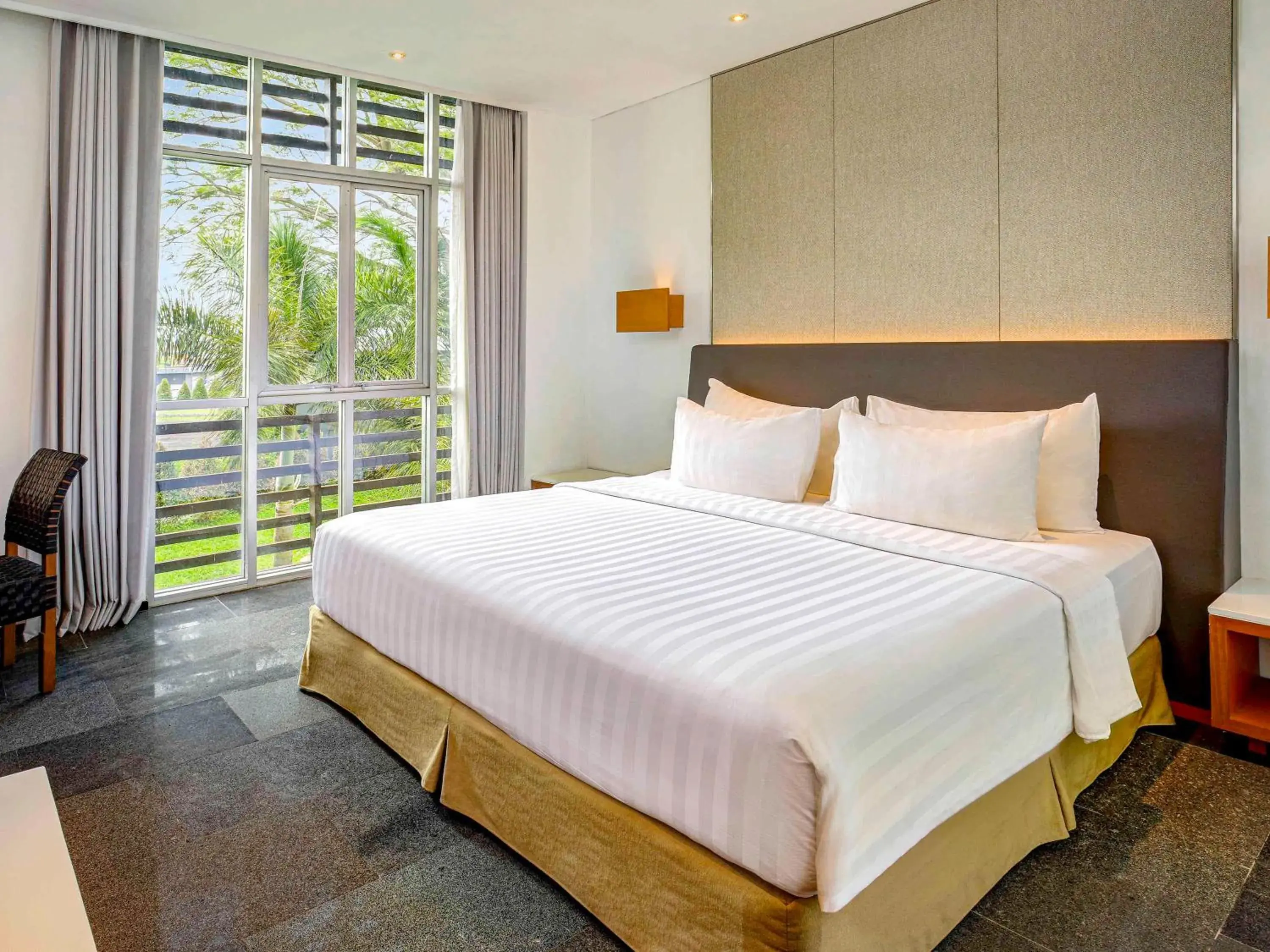 Photo of the whole room, Bed in Novotel Palembang Hotel