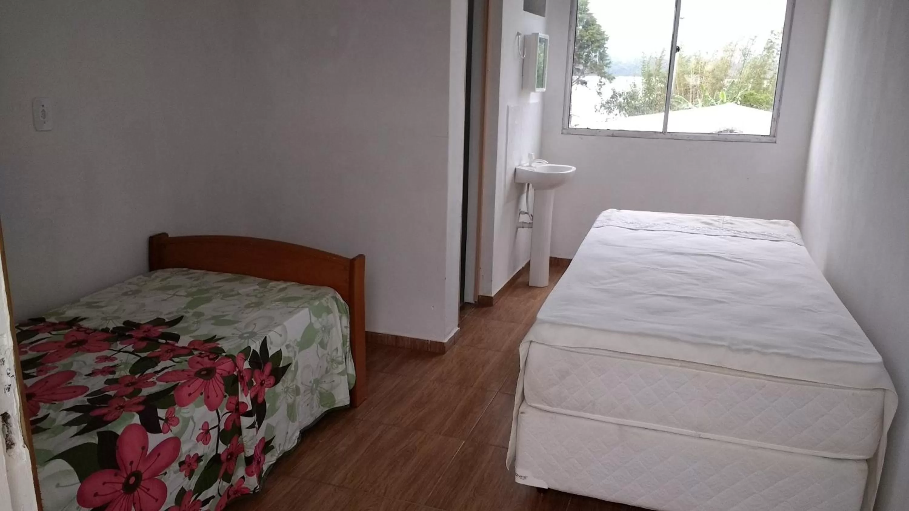 Bed in Pousada Araçatuba