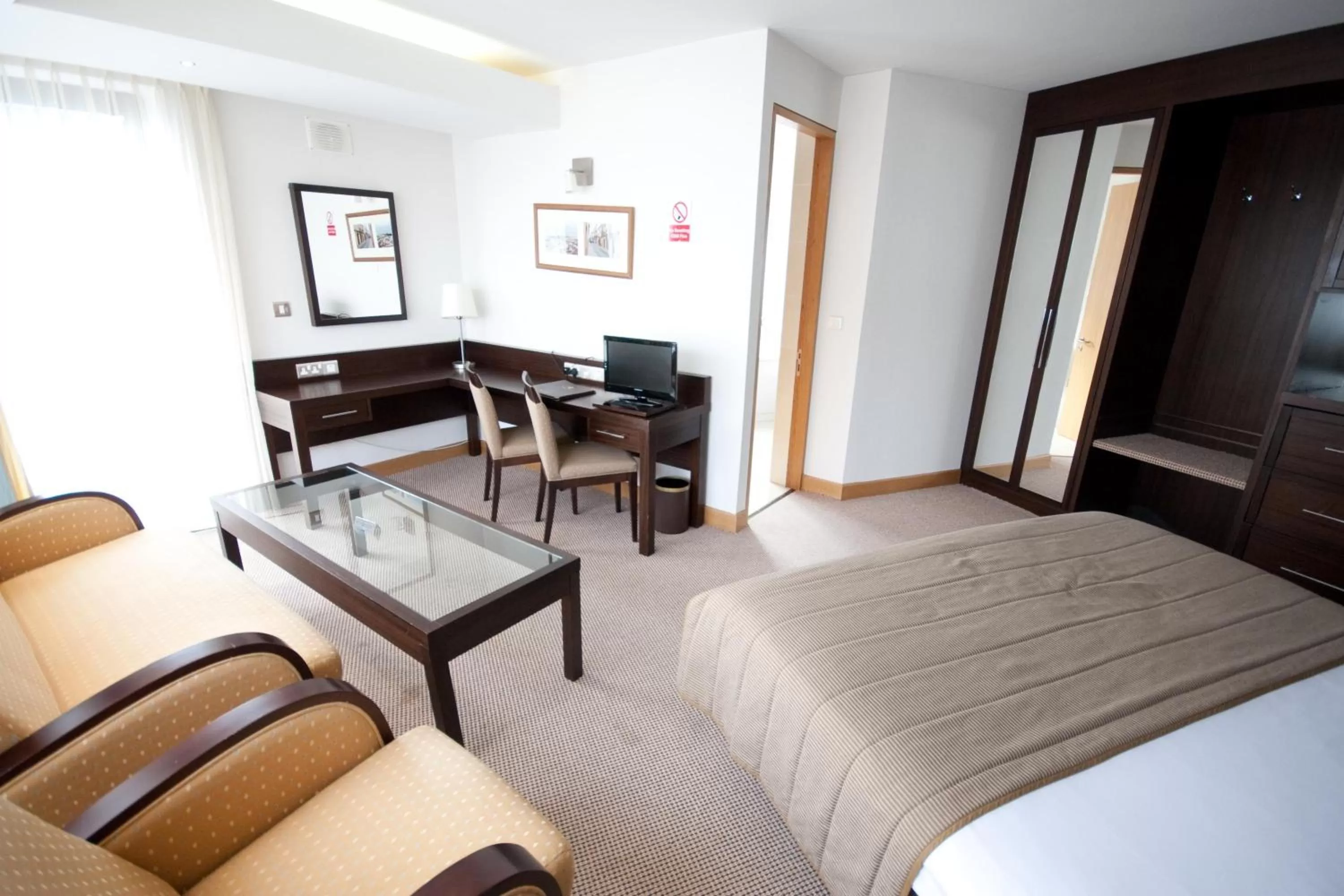 Photo of the whole room, Bed in White Sands Hotel