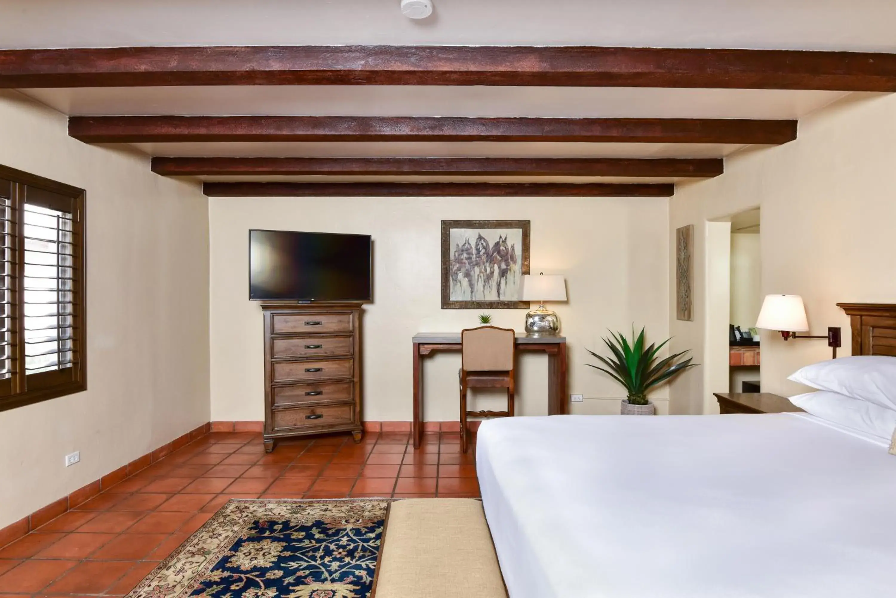 Bedroom, TV/Entertainment Center in Lodge On The Desert