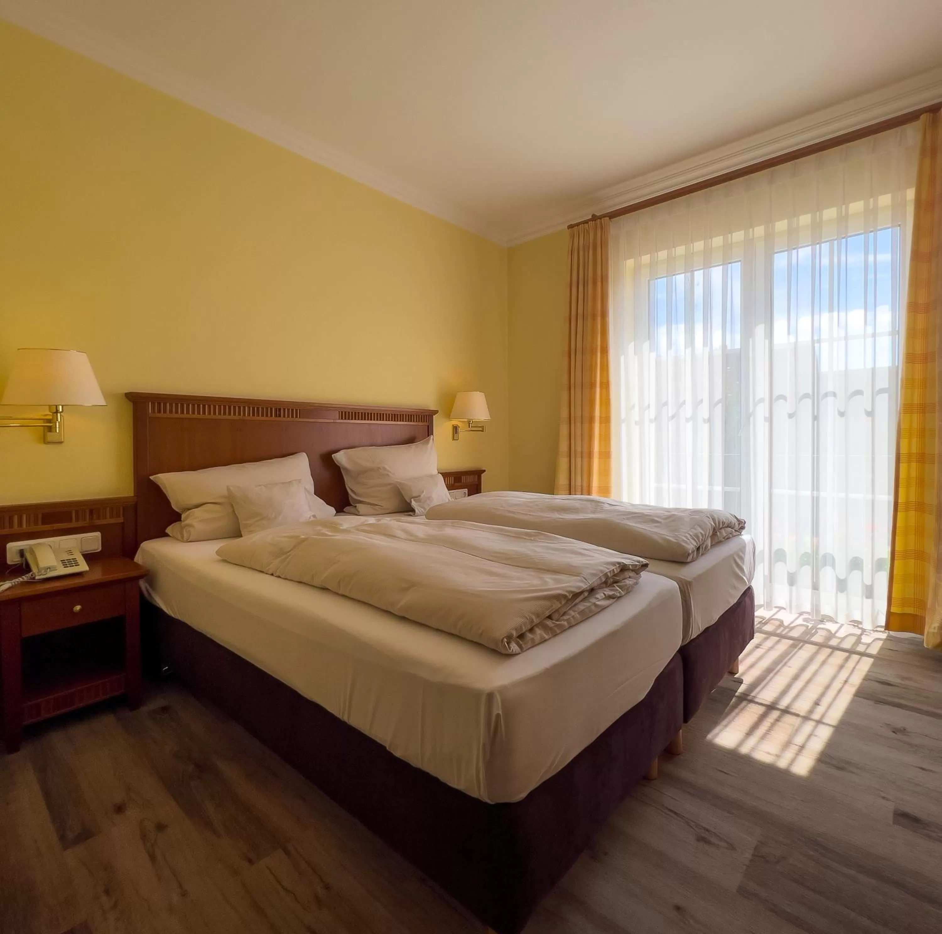 Bed in Hotel Landhaus Wörlitzer Hof