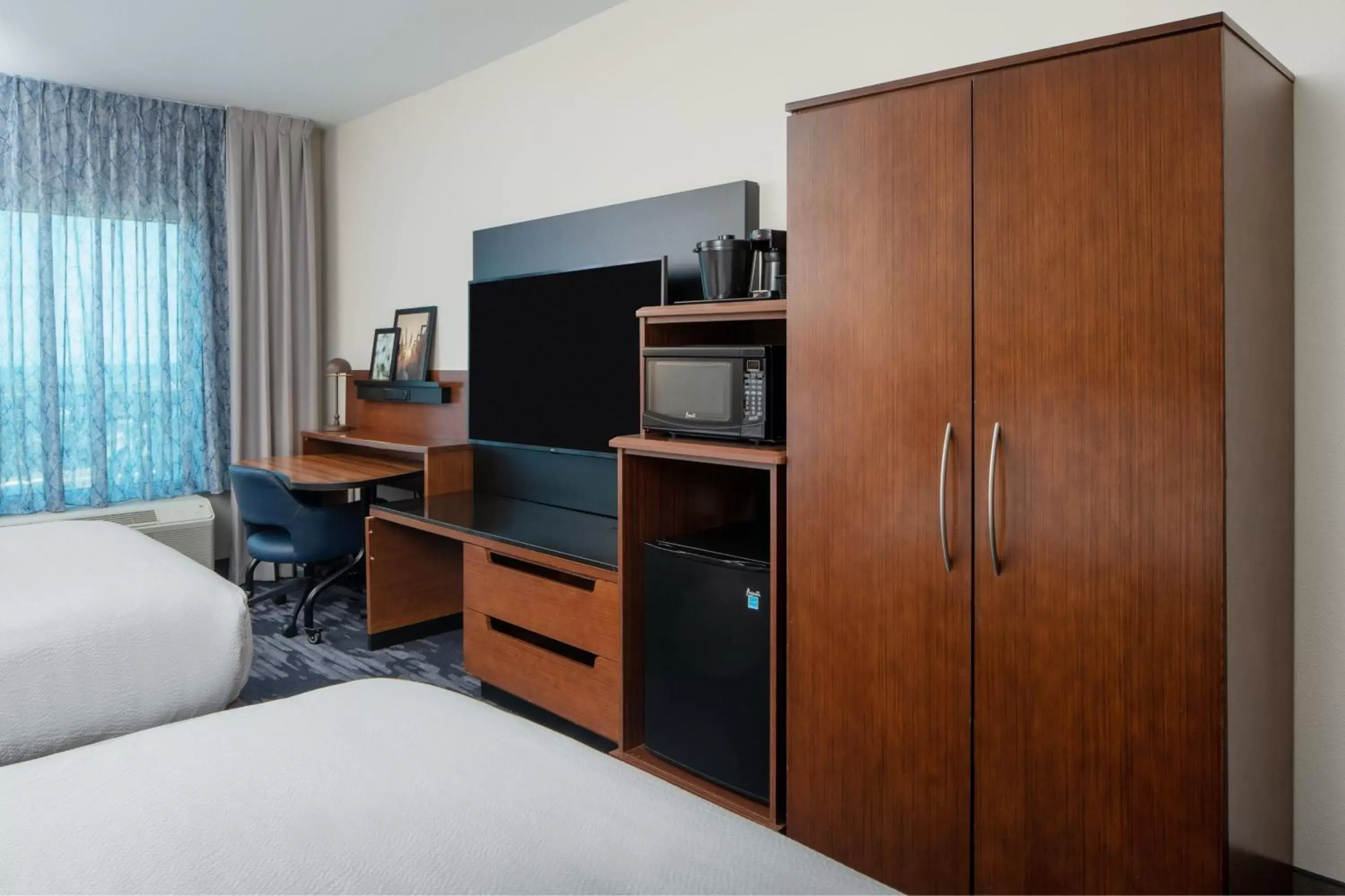 Photo of the whole room, TV/Entertainment Center in Fairfield Inn & Suites by Marriott Destin