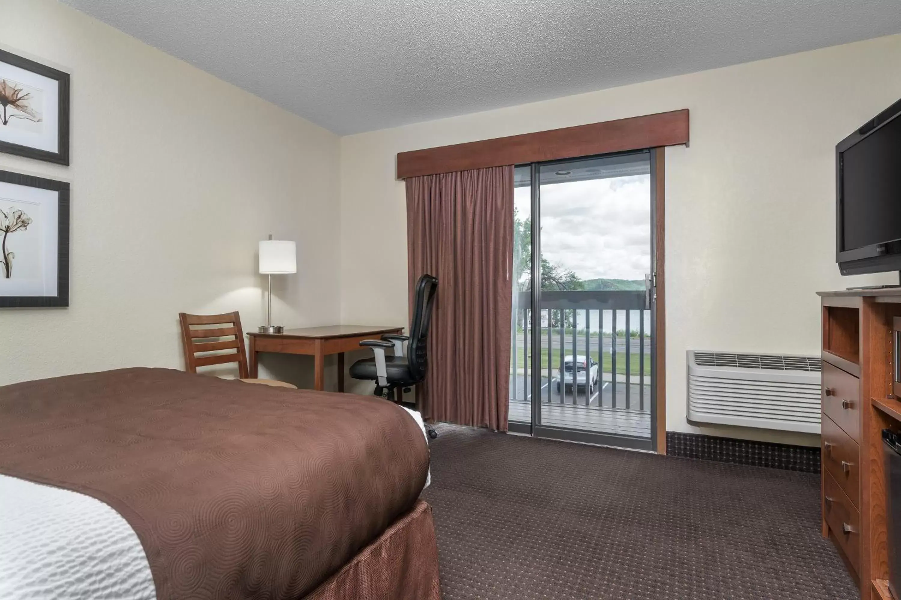 Photo of the whole room, Room Photo in AmericInn by Wyndham Lake City