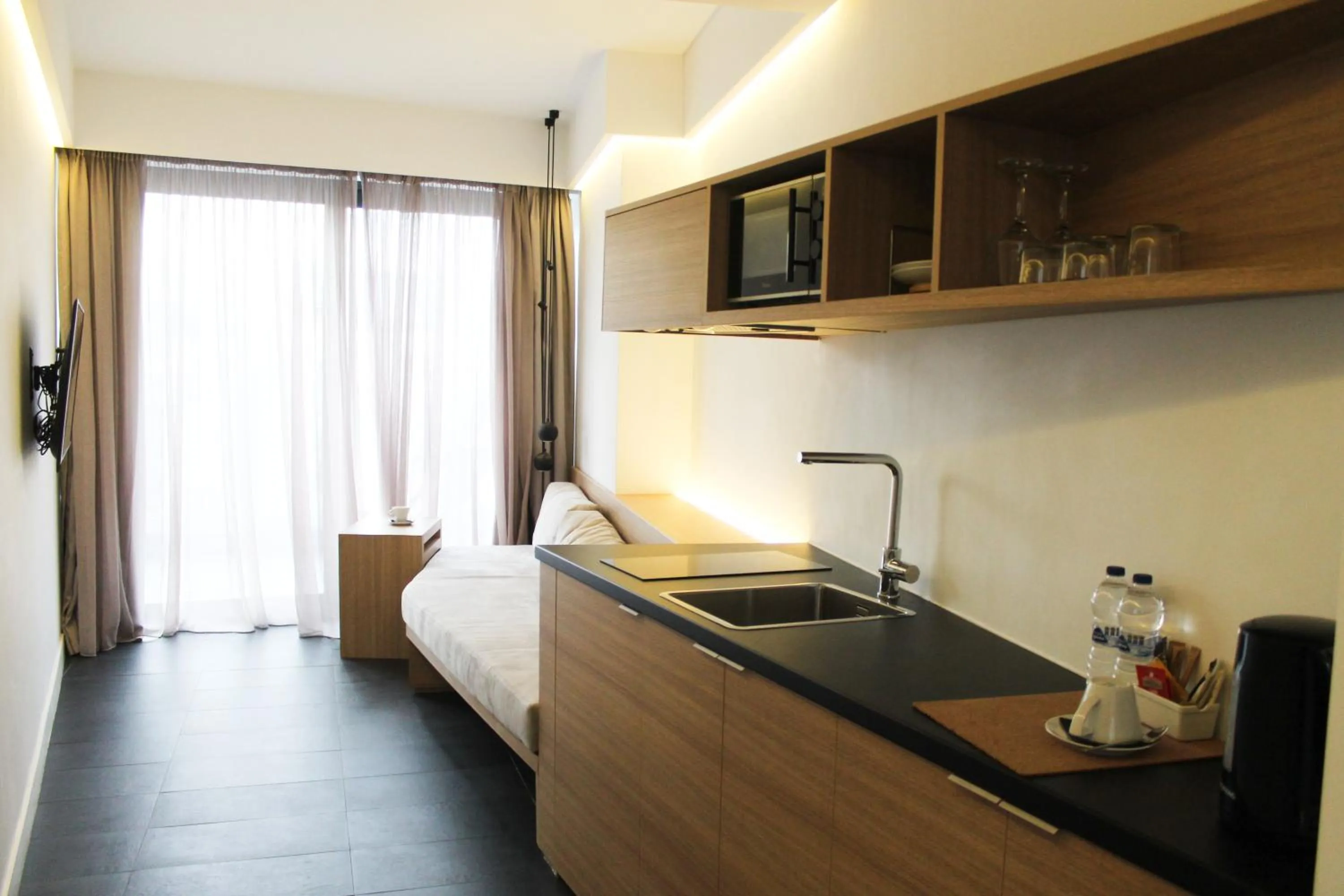 Kitchen or kitchenette in Athens Lodge by Athens Prime Hotels