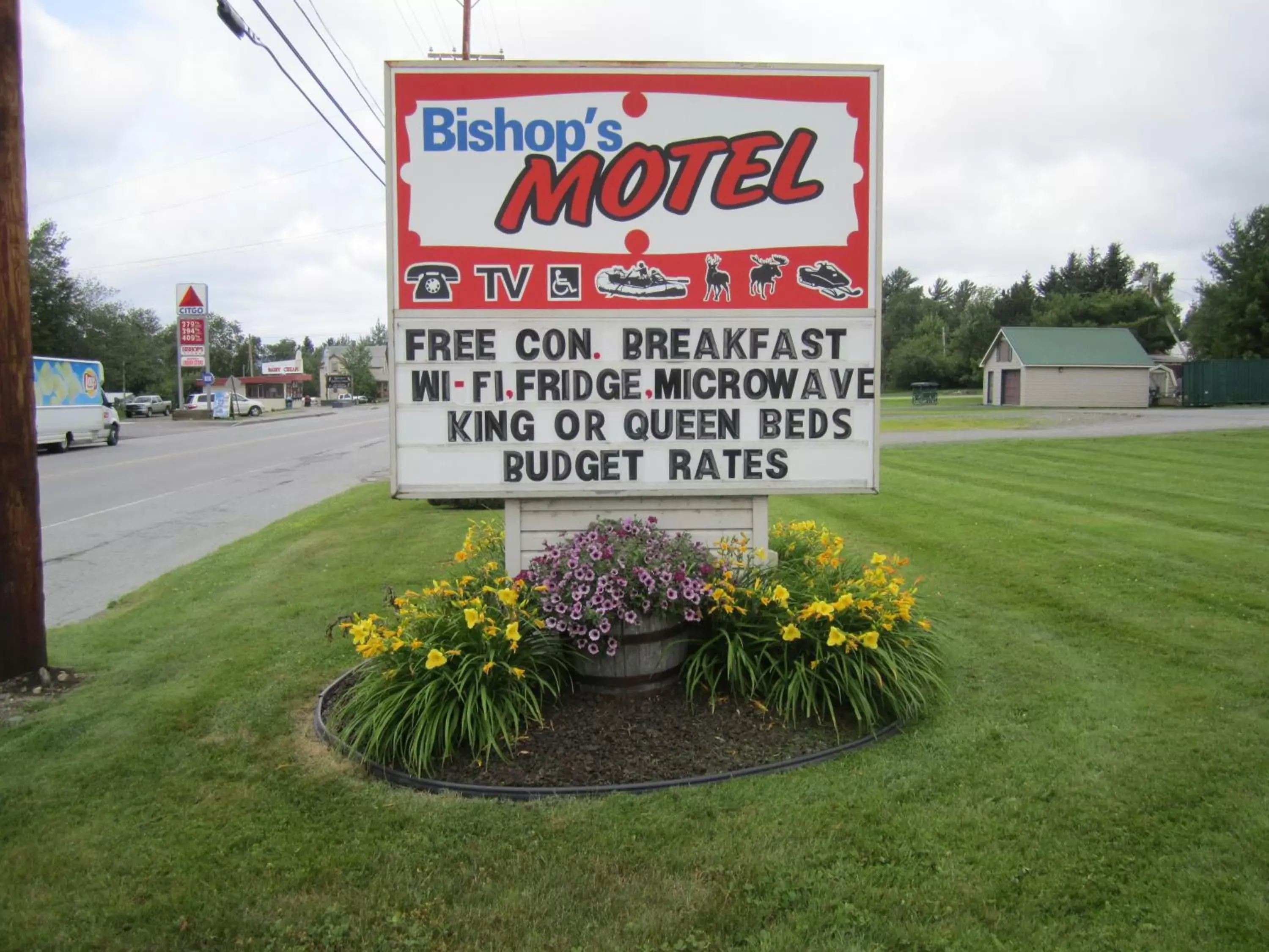 Property logo or sign in Bishops Country Inn Motel