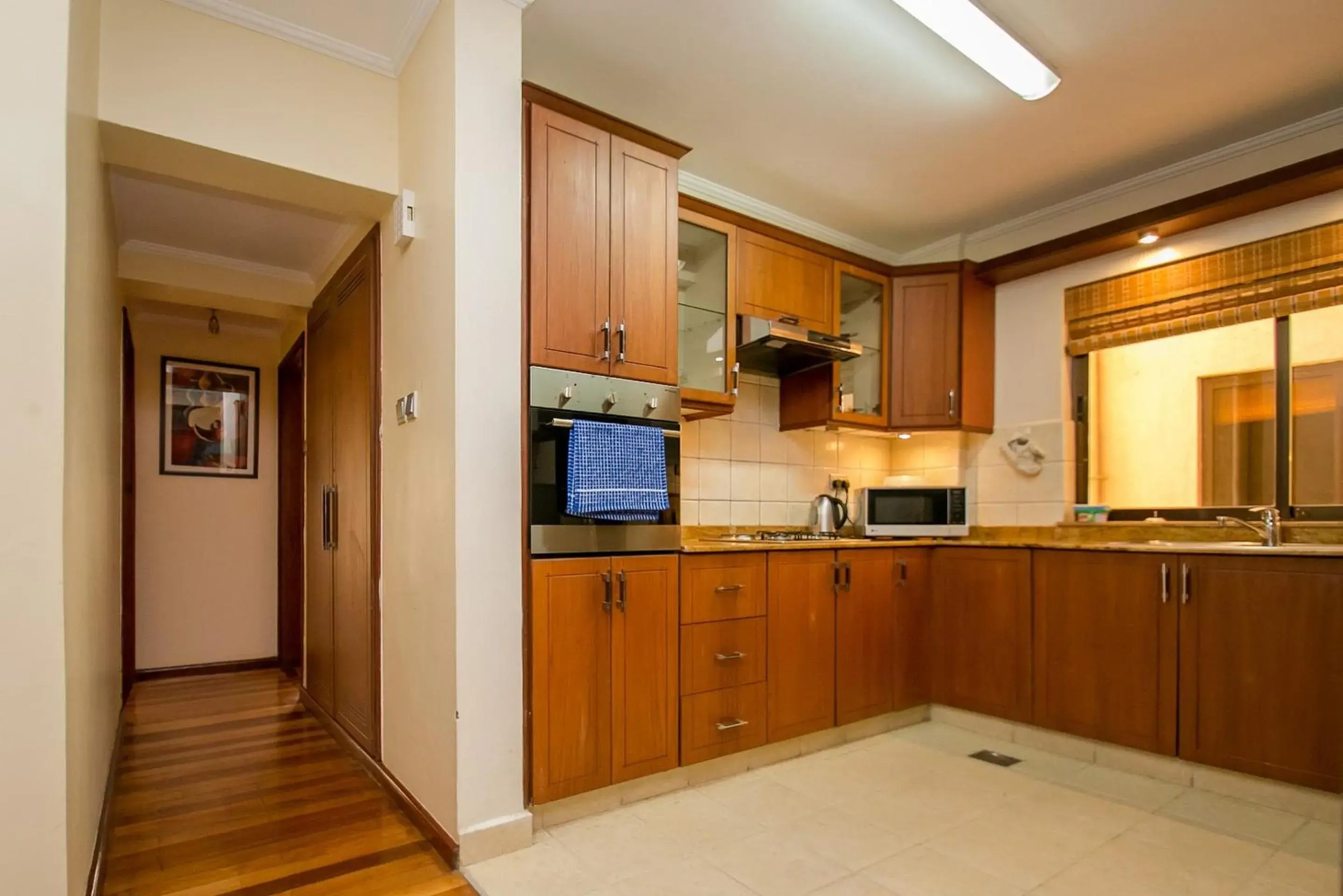 Kitchen or kitchenette, Kitchen/Kitchenette in Waridi Paradise Hotel and Suites