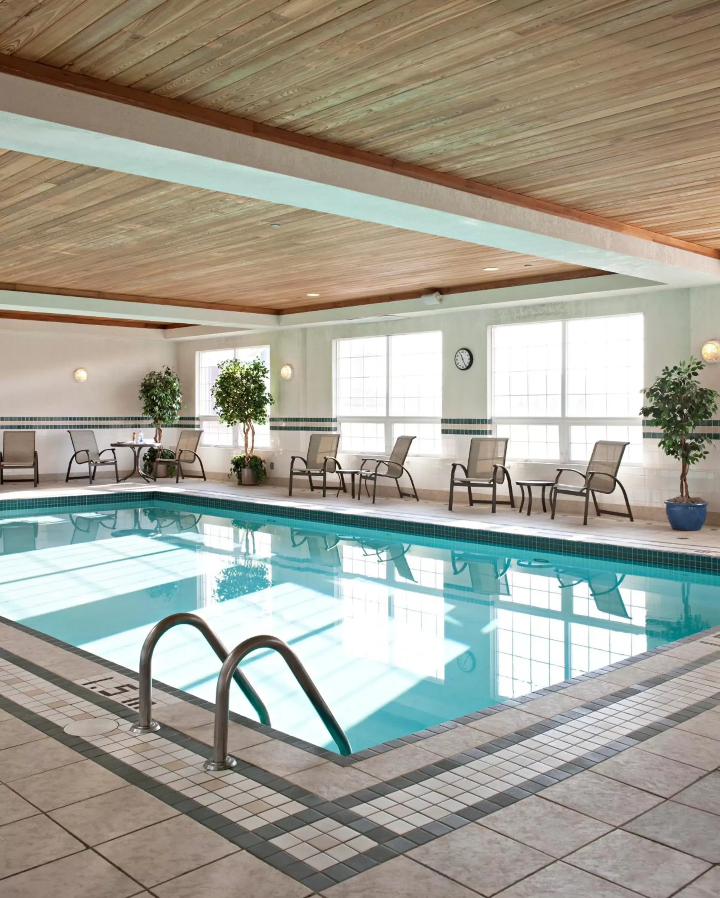 Swimming Pool in Country Inn & Suites by Radisson, Calgary-Northeast