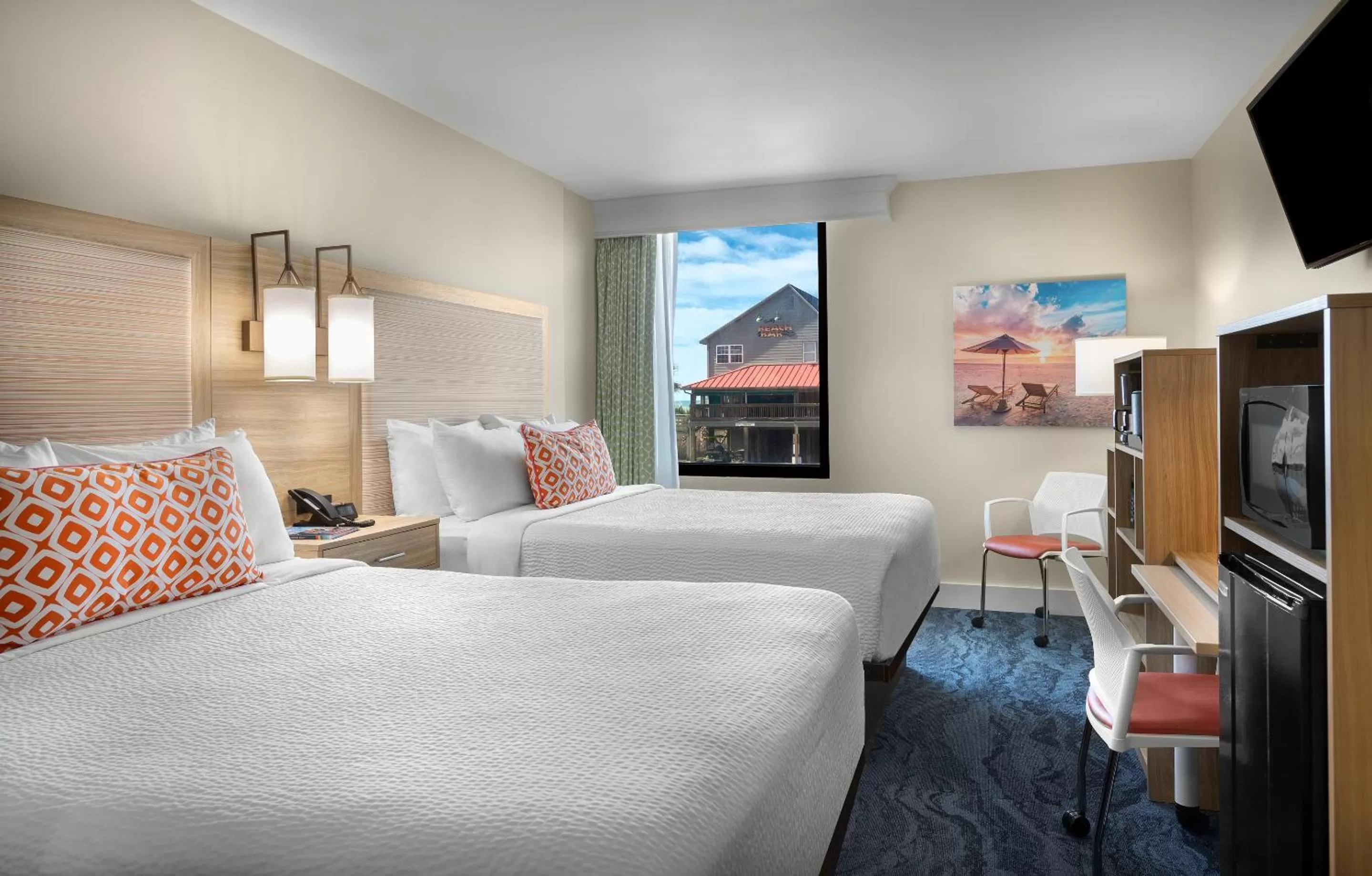 Bed in Surfside Beach Oceanfront Hotel