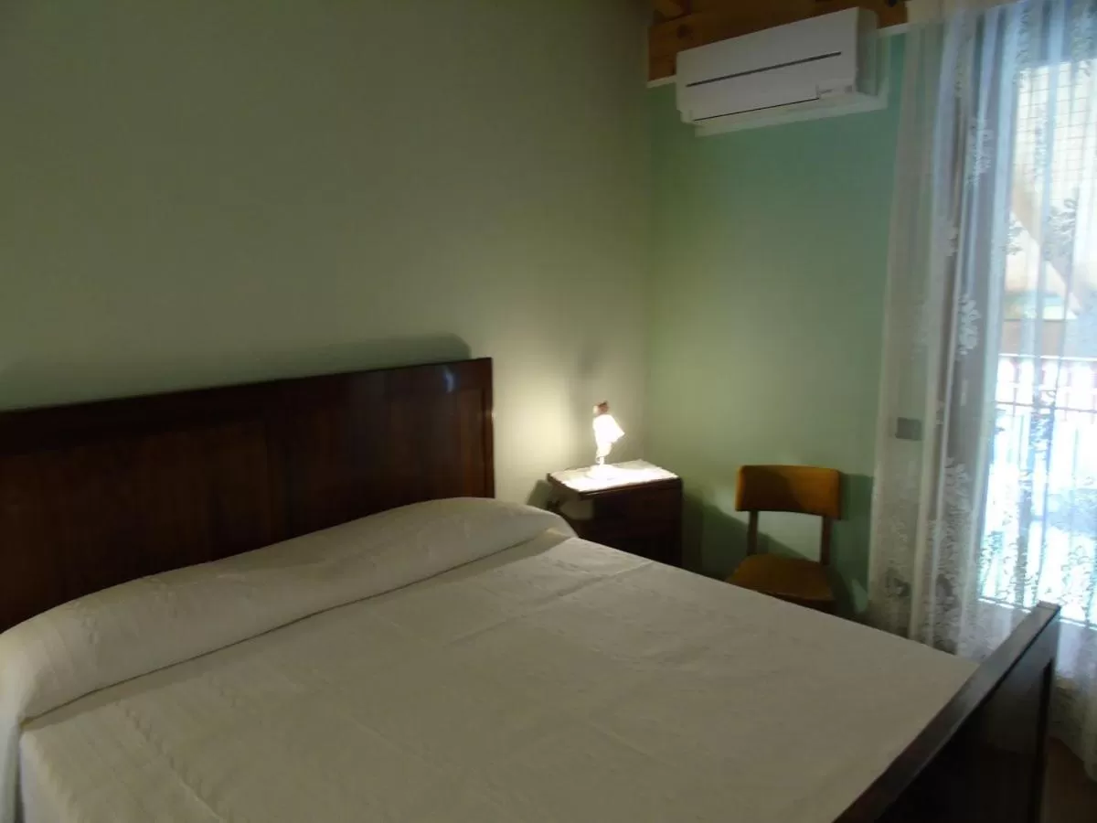 Bed in B&B Ai Cipressi