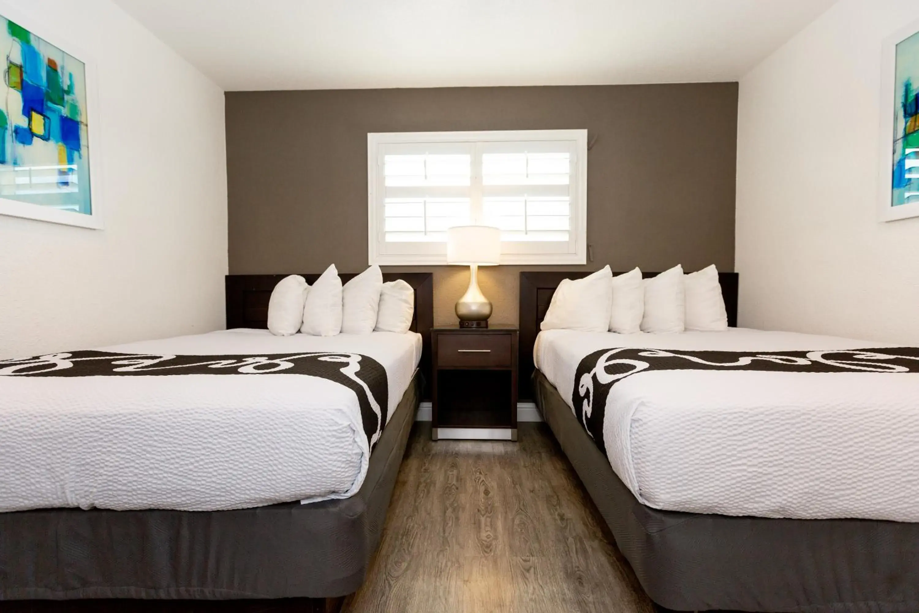 Bed in SureStay Hotel by Best Western Seaside Monterey