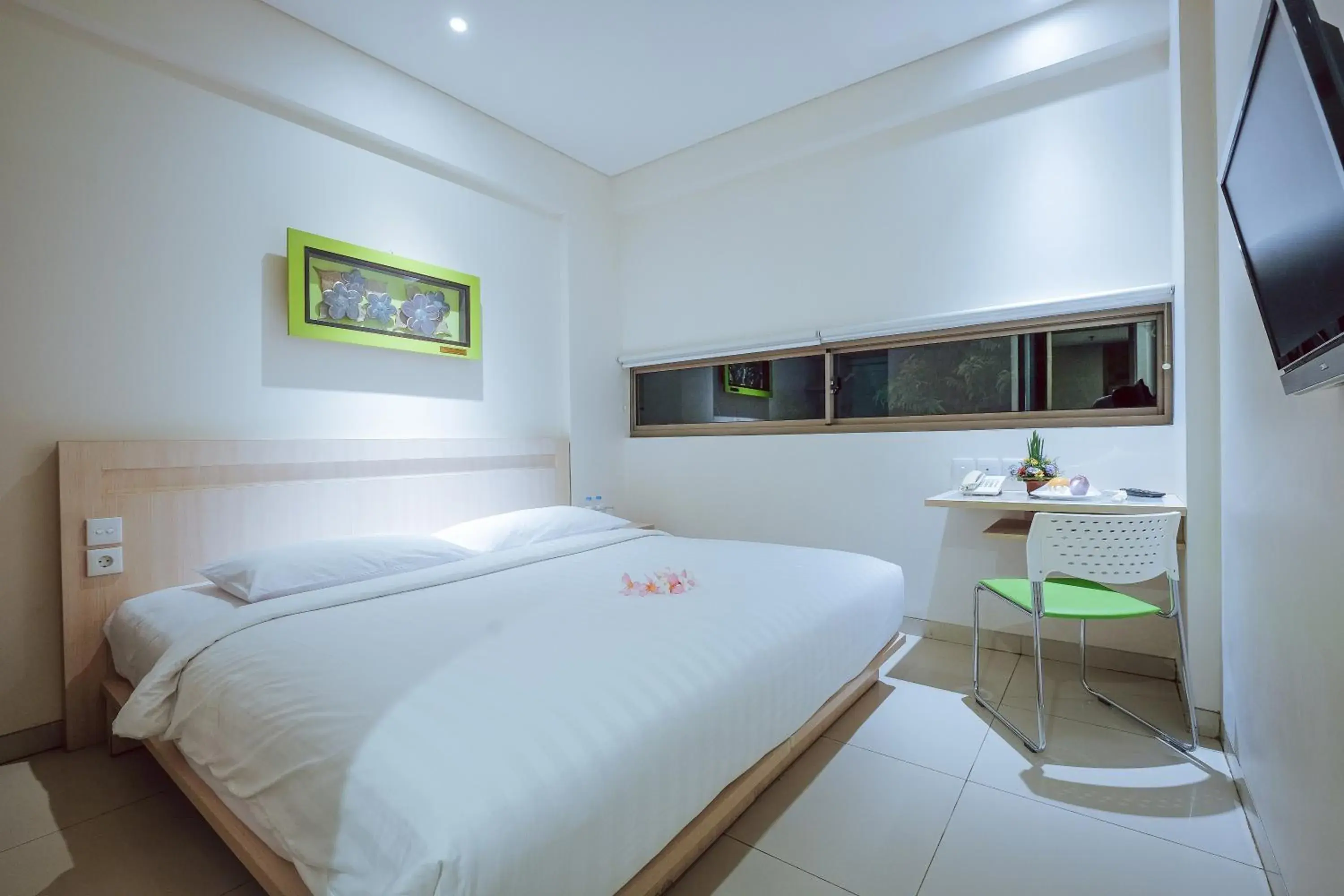 Bed in J Hotel Kuta