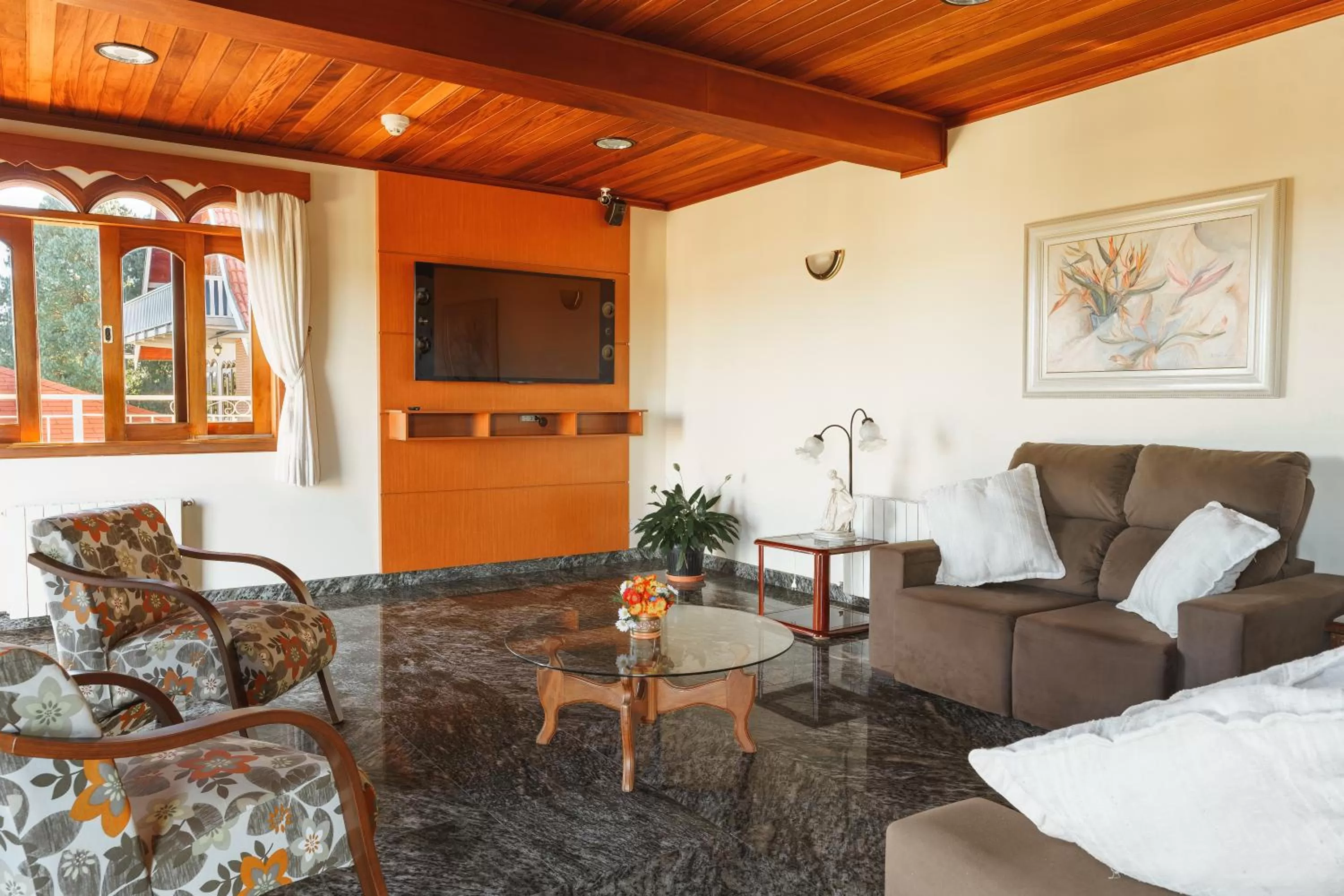 Communal lounge/ TV room in Pousada Recanto Almeida