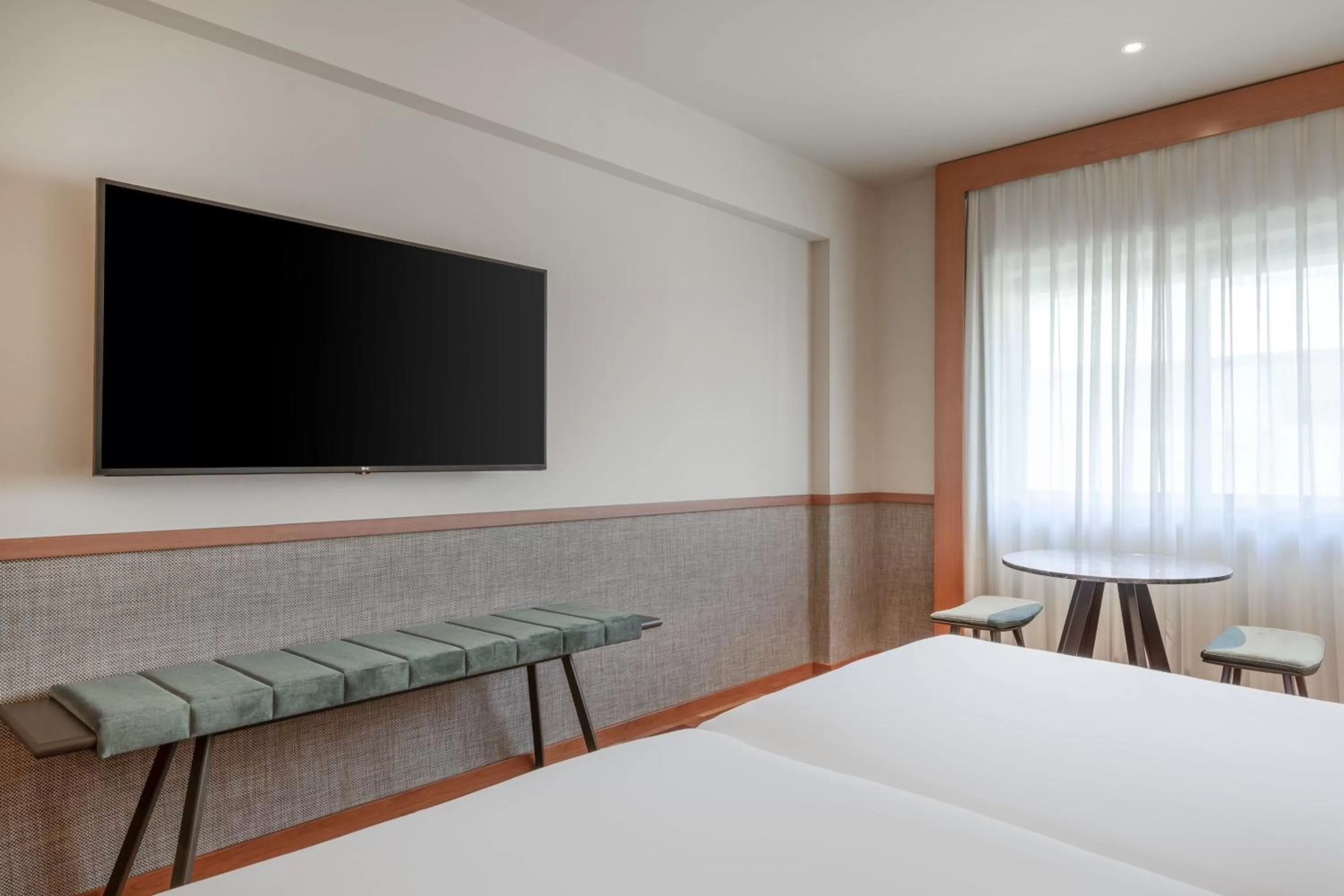 Photo of the whole room, TV/Entertainment Center in AC Hotel Aravaca by Marriott