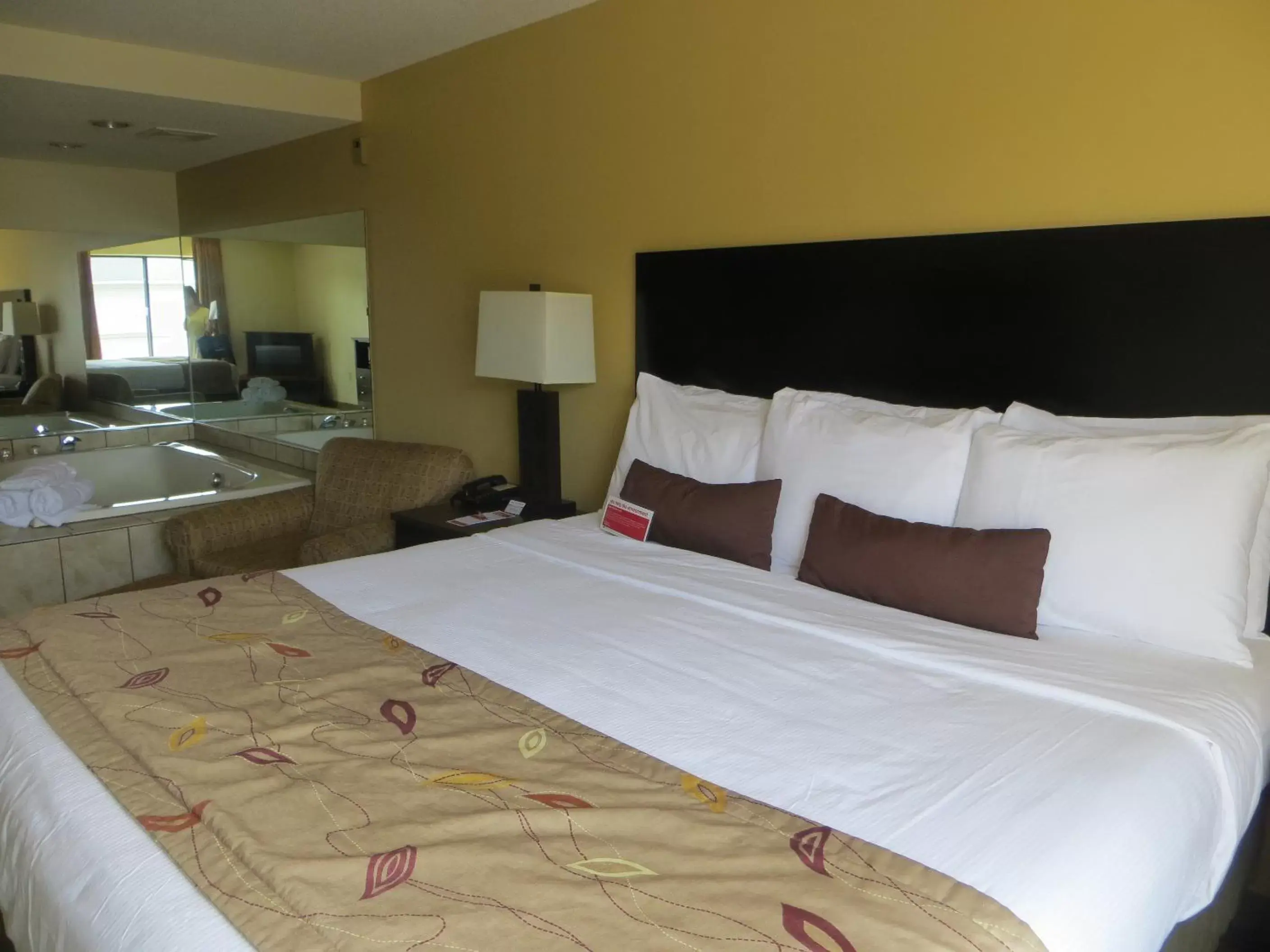 Bed in Ramada by Wyndham Wisconsin Dells