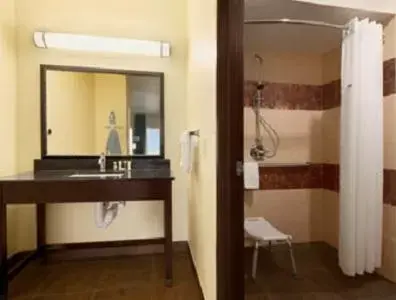 Bathroom in Super 8 by Wyndham Dilley TX