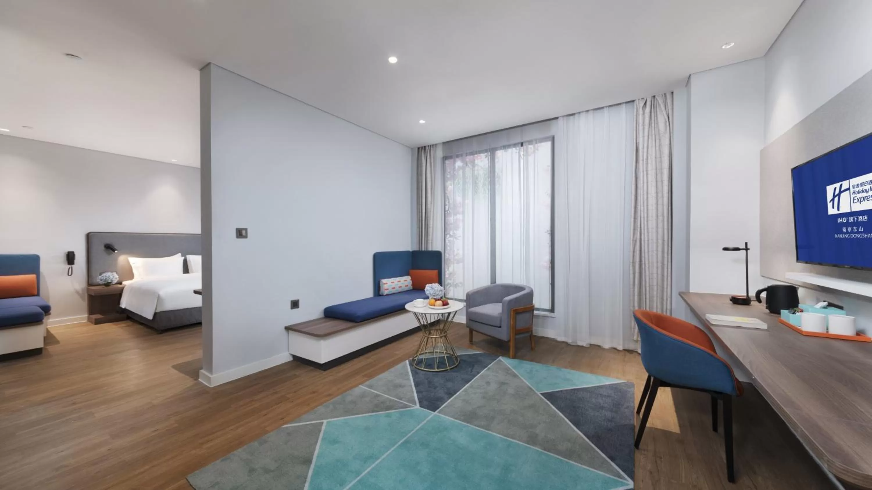 Photo of the whole room, Seating Area in Holiday Inn Express Nanjing Dongshan, an IHG Hotel