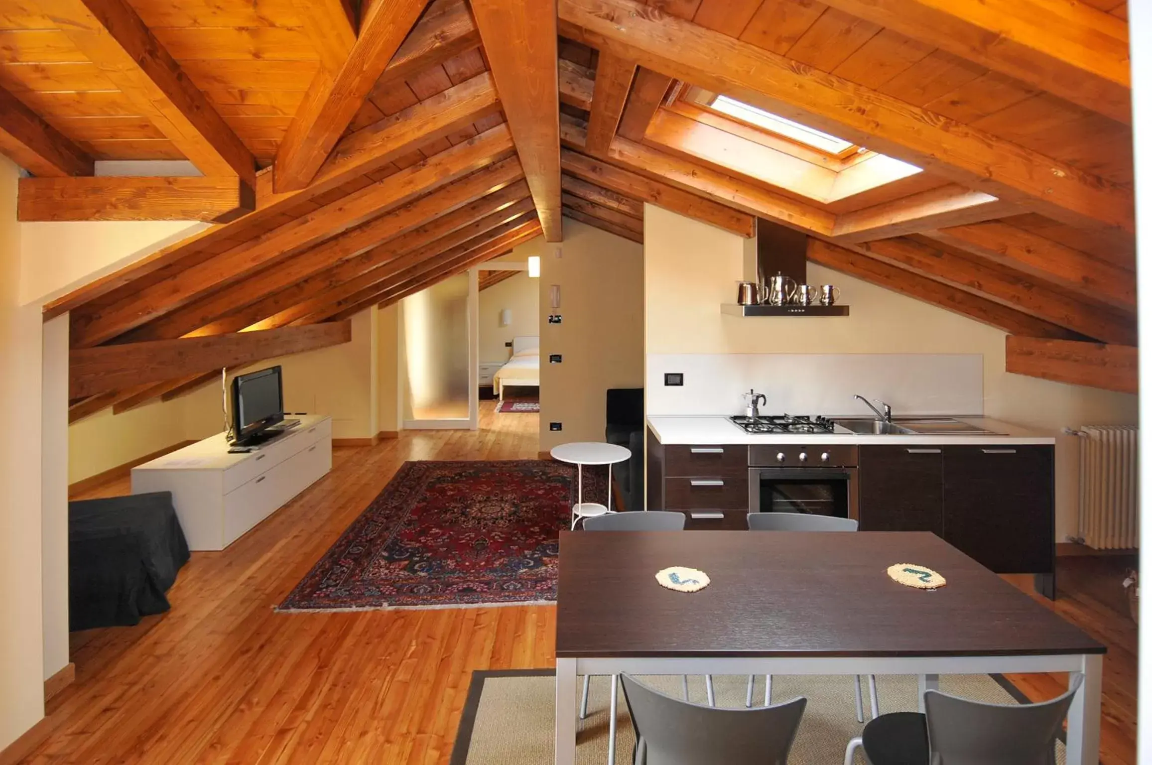 Seating area, Kitchen/Kitchenette in Hotel Ristorante La Quartina