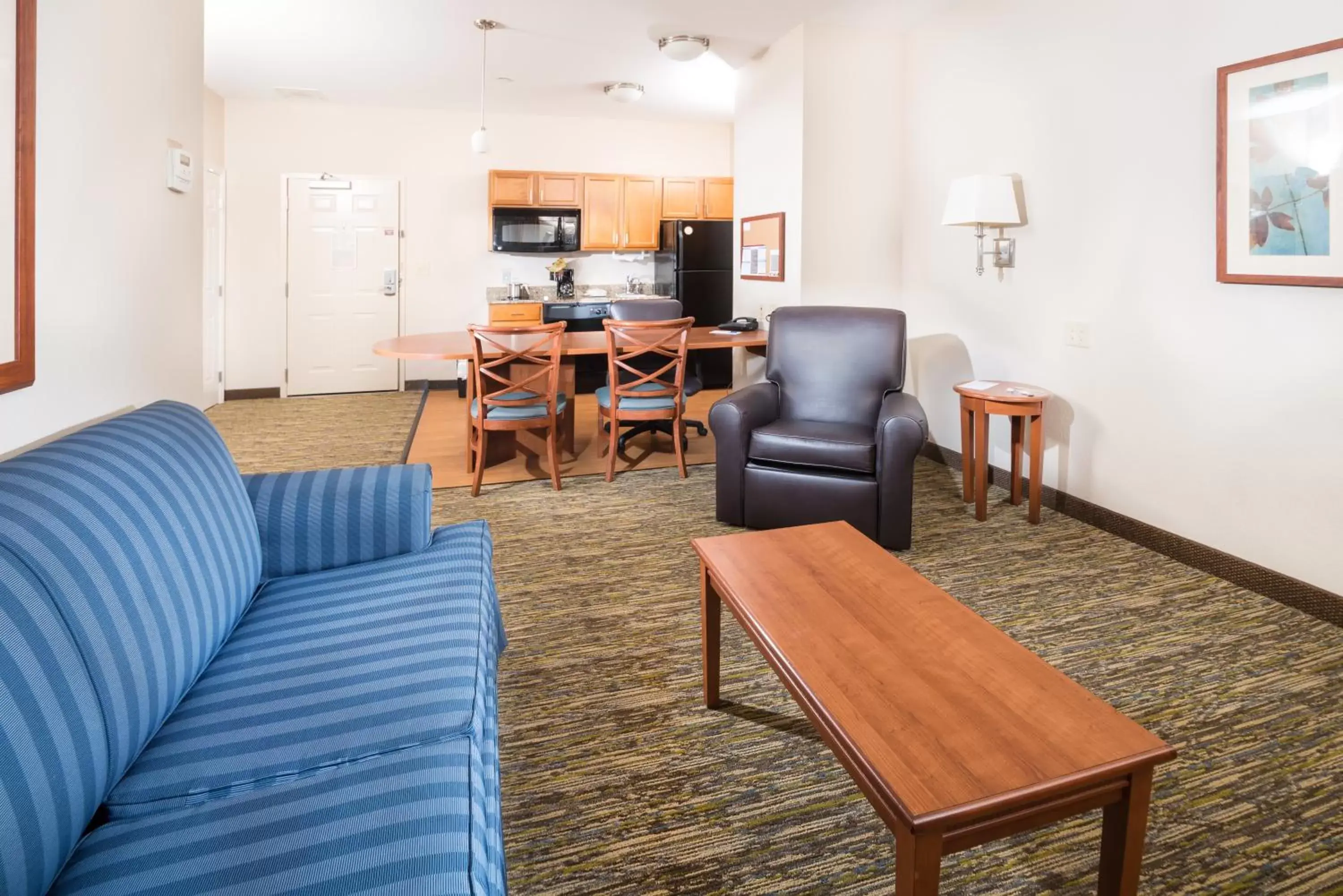 Photo of the whole room, Seating Area in Candlewood Suites Wake Forest-Raleigh Area, an IHG Hotel