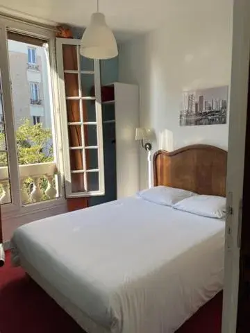 Bed in Hôtel Verlaine