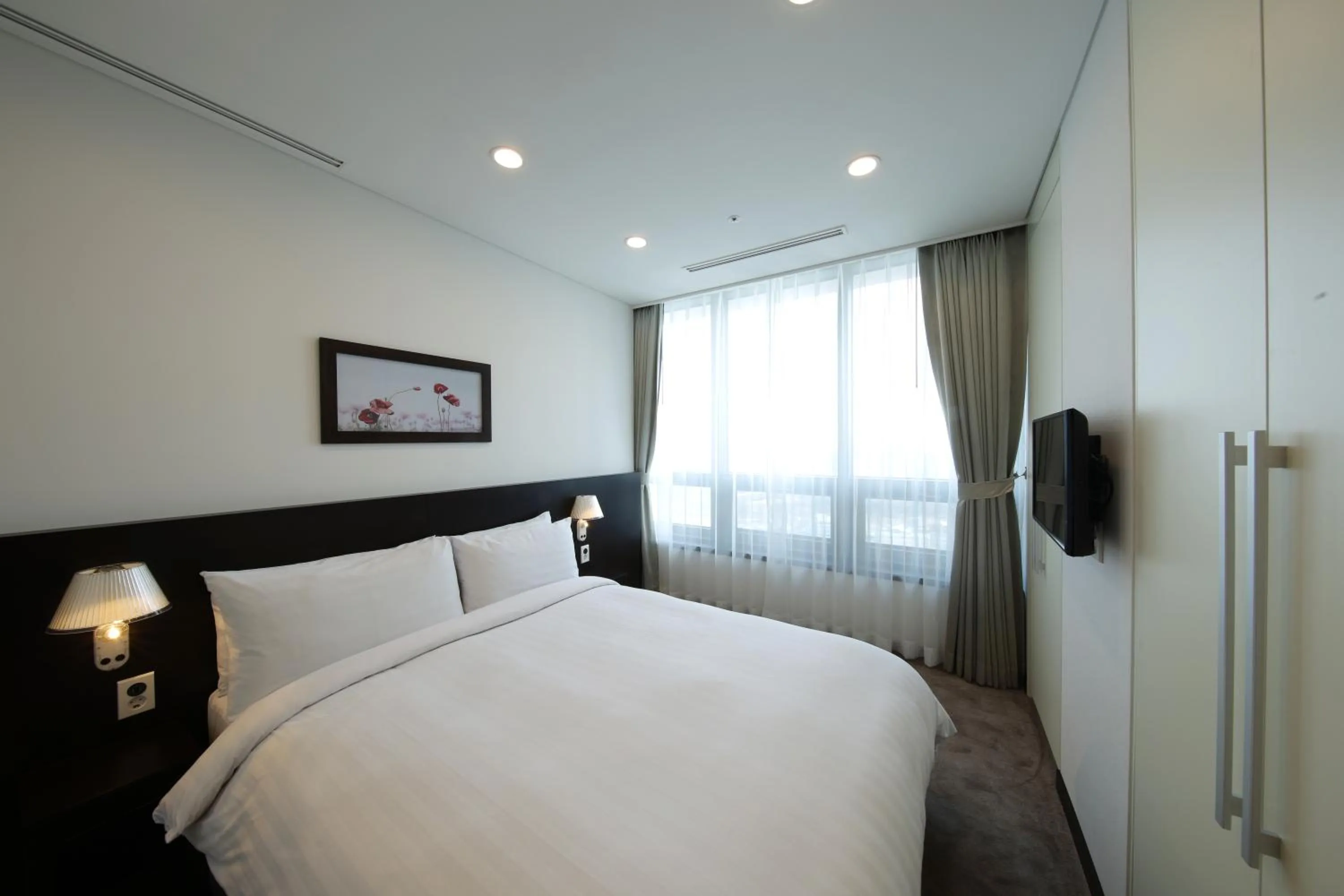 Bed in Orakai Insadong Suites