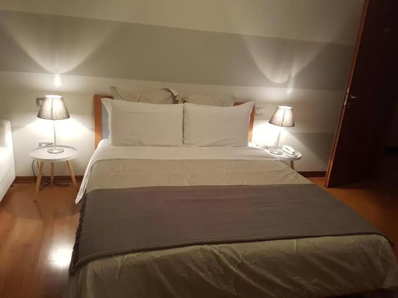 Bed in Hotel Moniga