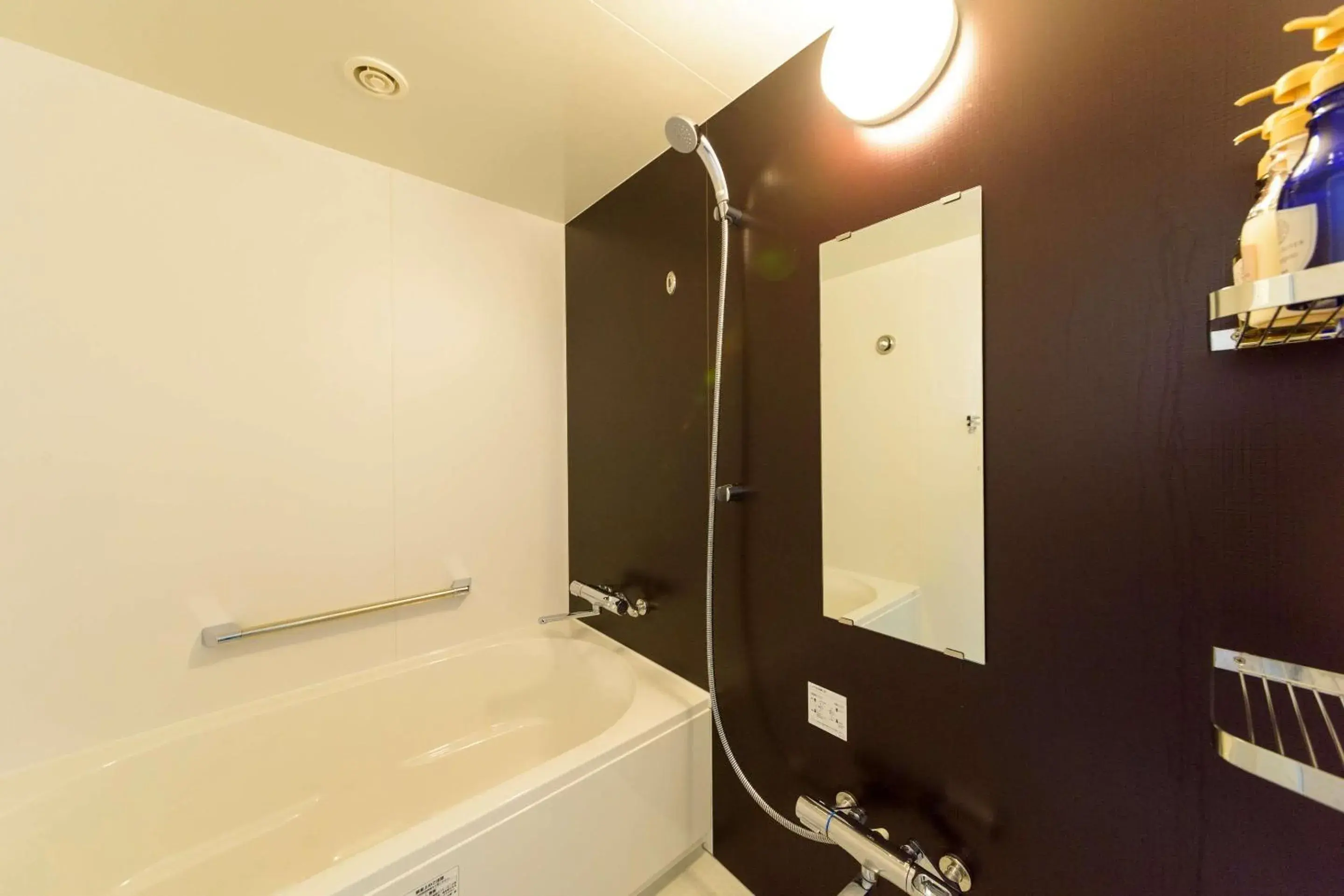 Bathroom in SureStay Plus Hotel by Best Western Shin-Osaka