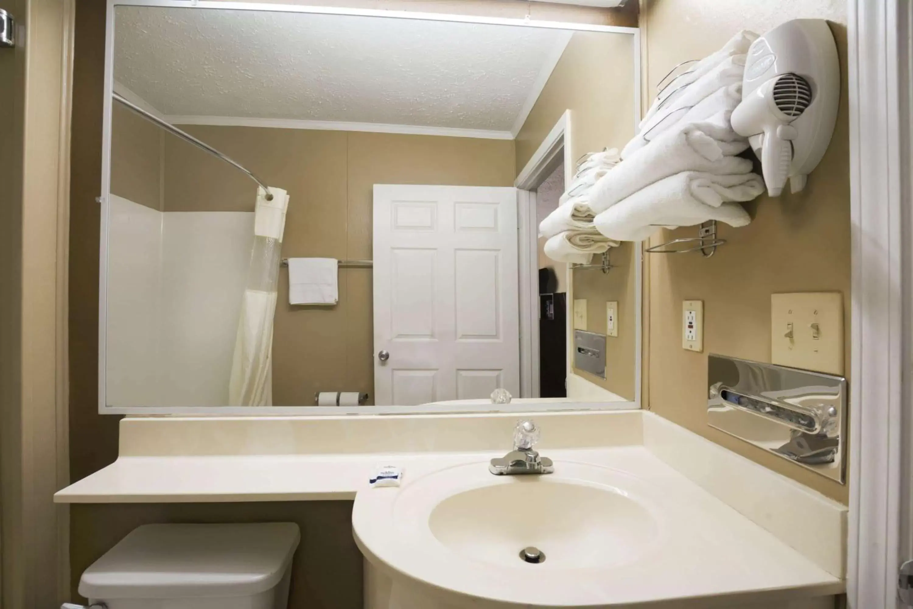 Bathroom in Microtel Inn & Suites by Wyndham Columbia Fort Jackson N