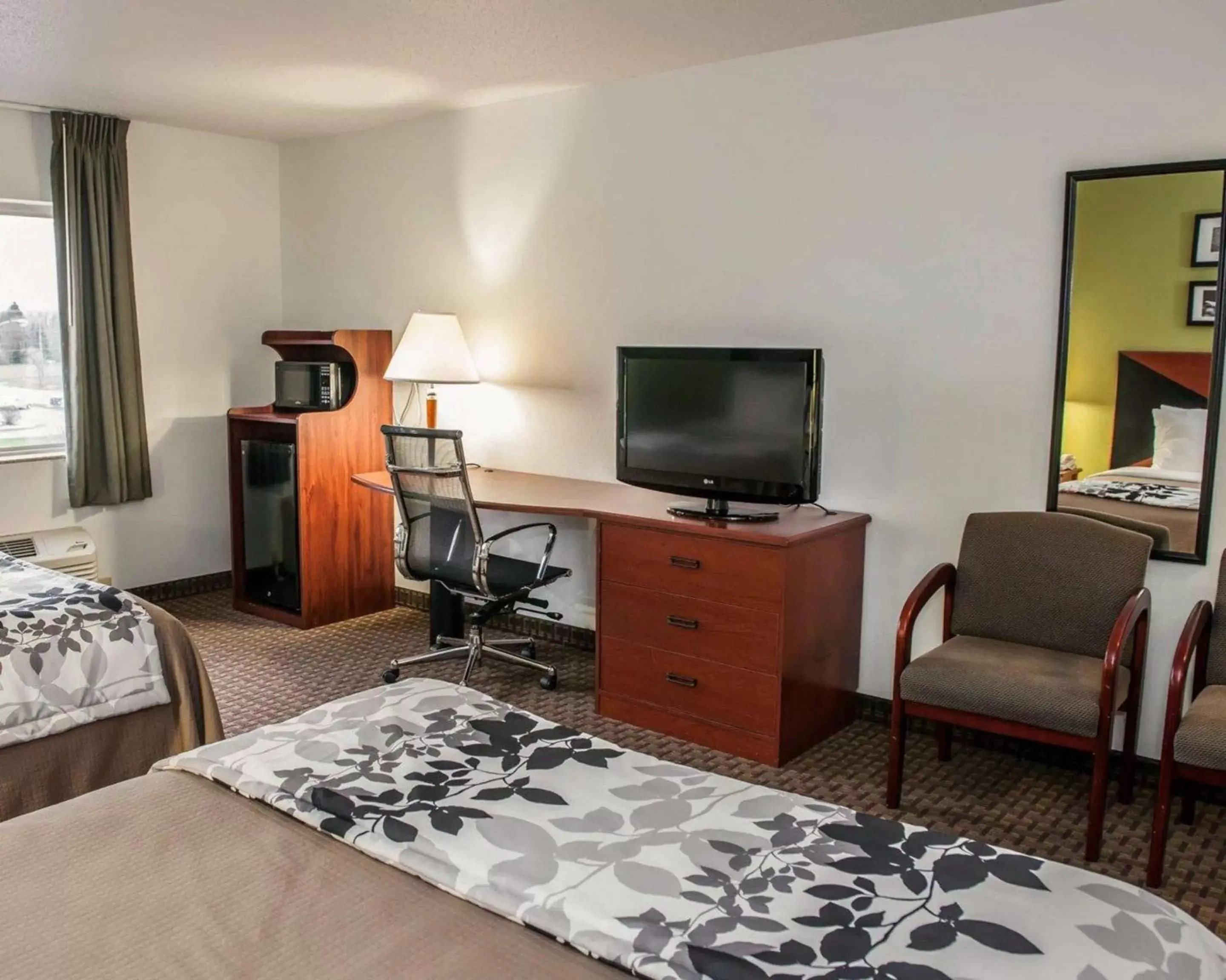 Photo of the whole room, TV/Entertainment Center in Sleep Inn South Bend Airport