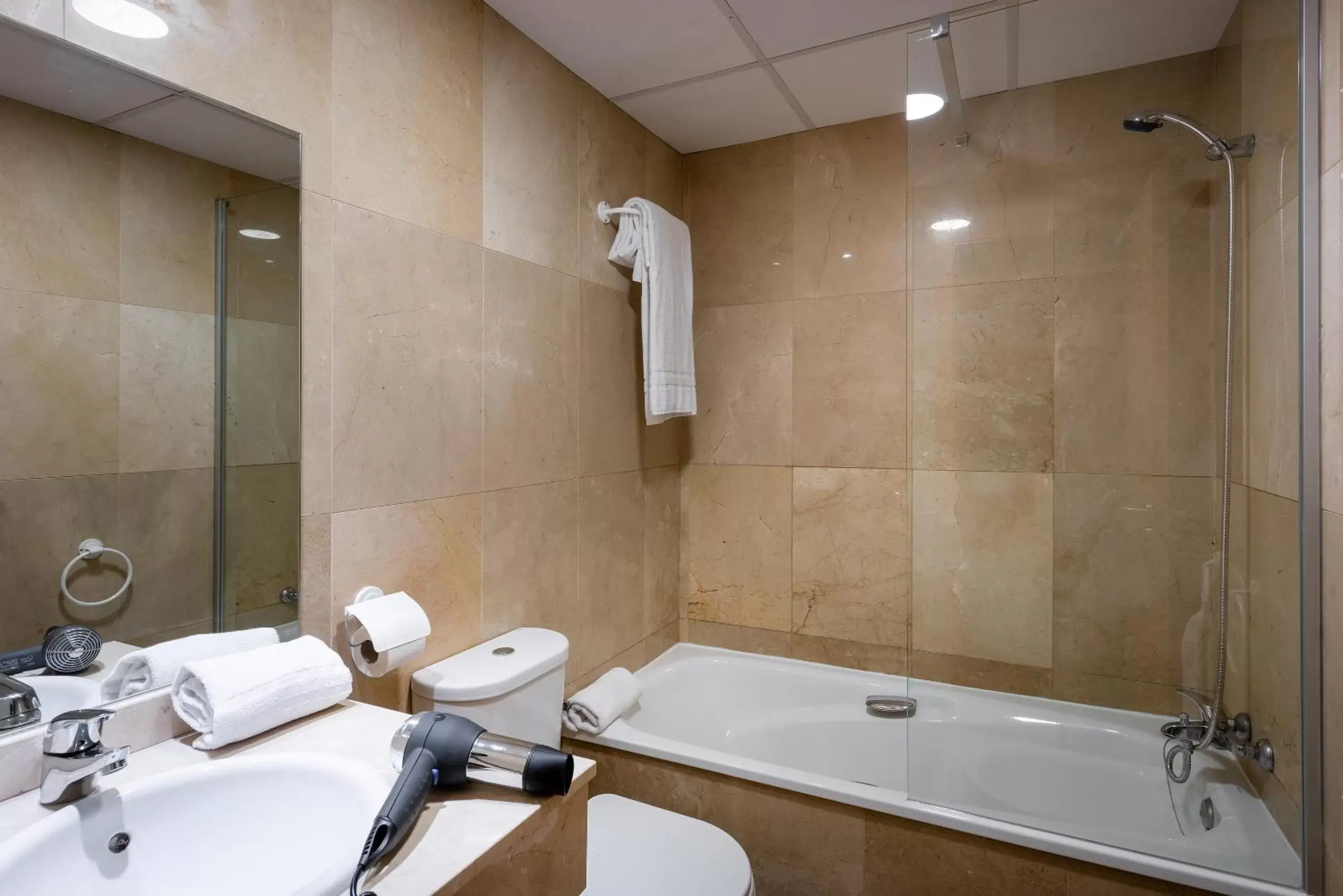 Bathroom in Madrid Airport Suites, Affiliated by Meliá
