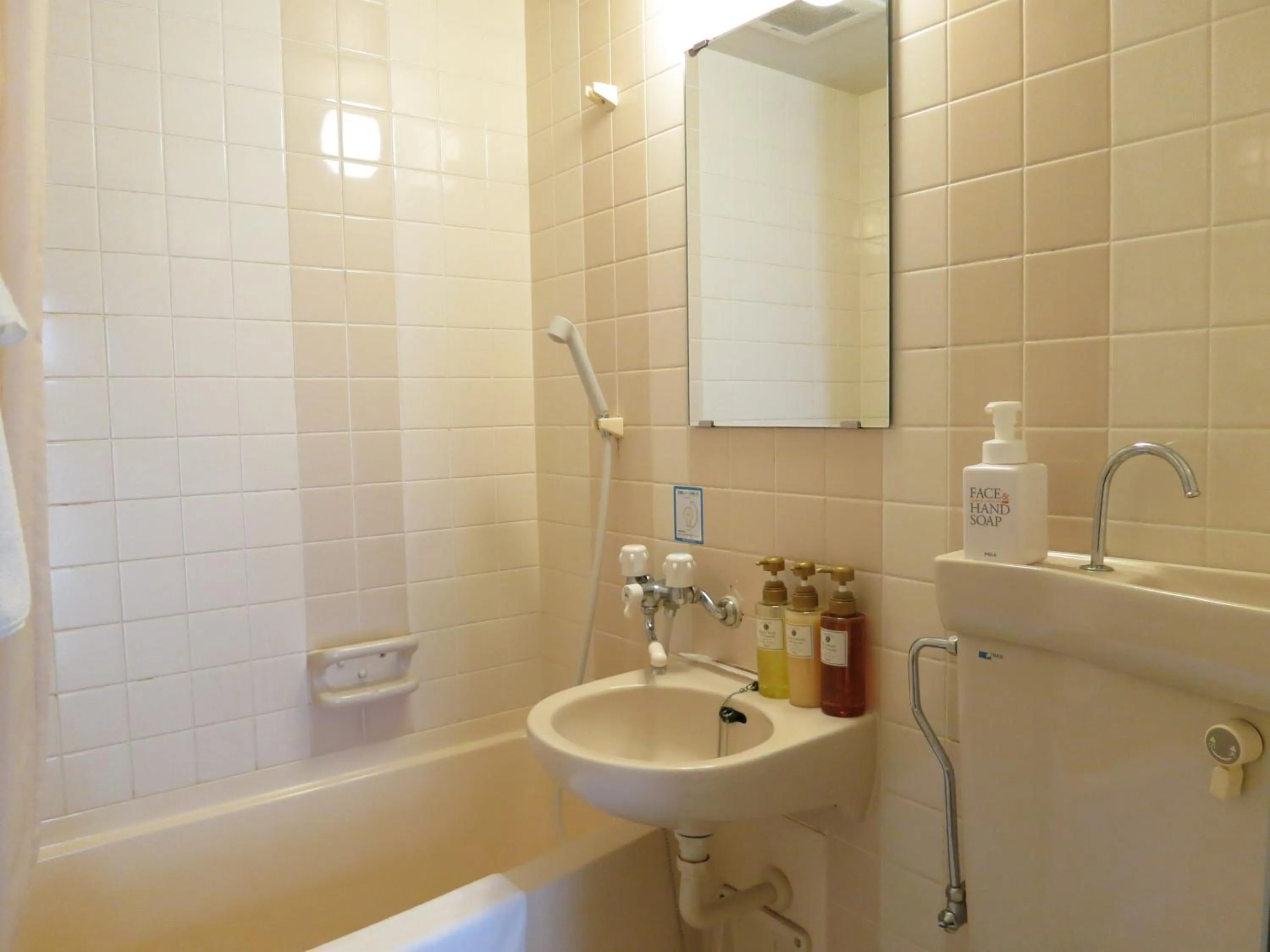 Bathroom in Heiwadai Hotel 5