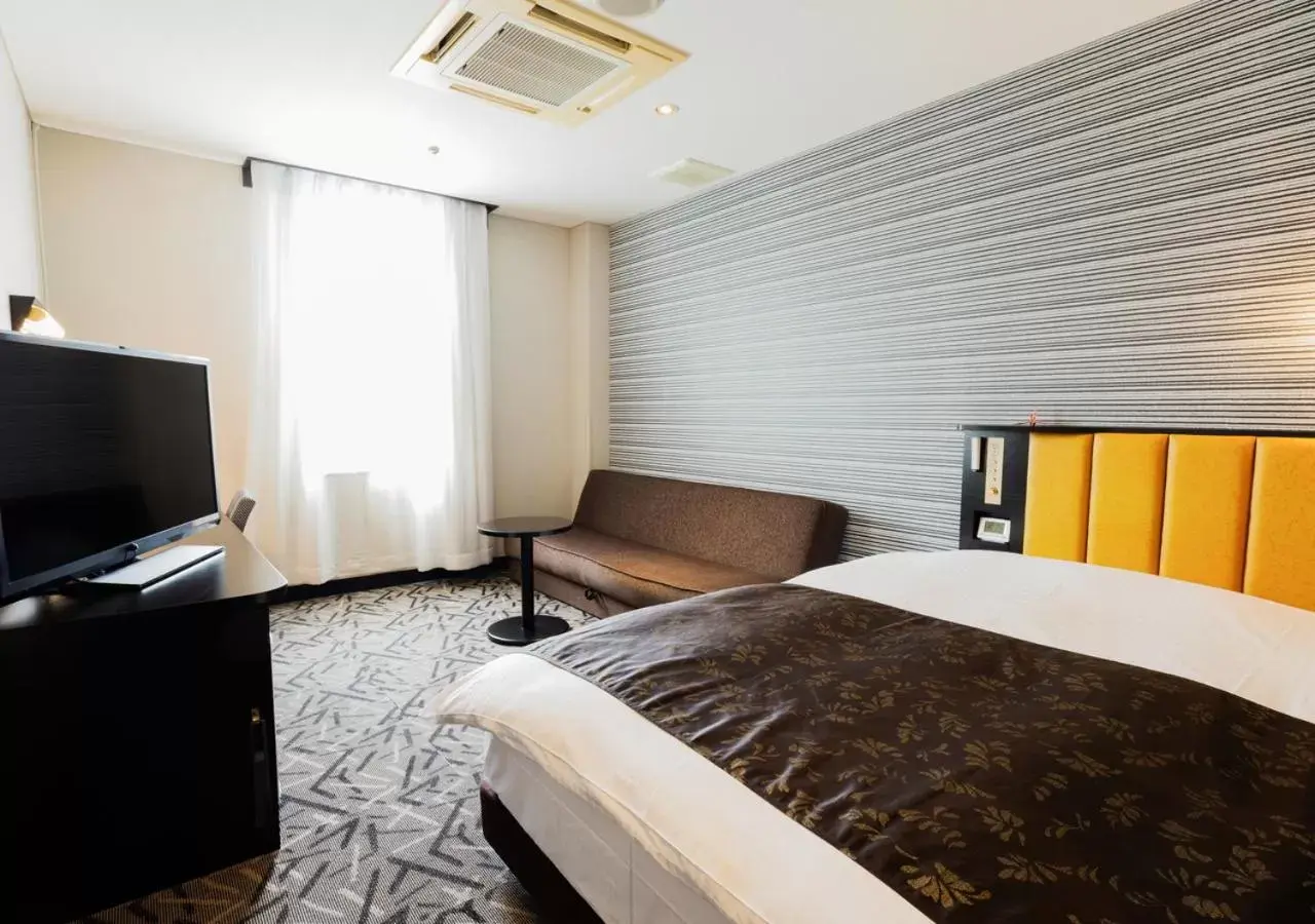 Photo of the whole room, Bed in APA Hotel Fukuoka Yukuhashi Ekimae