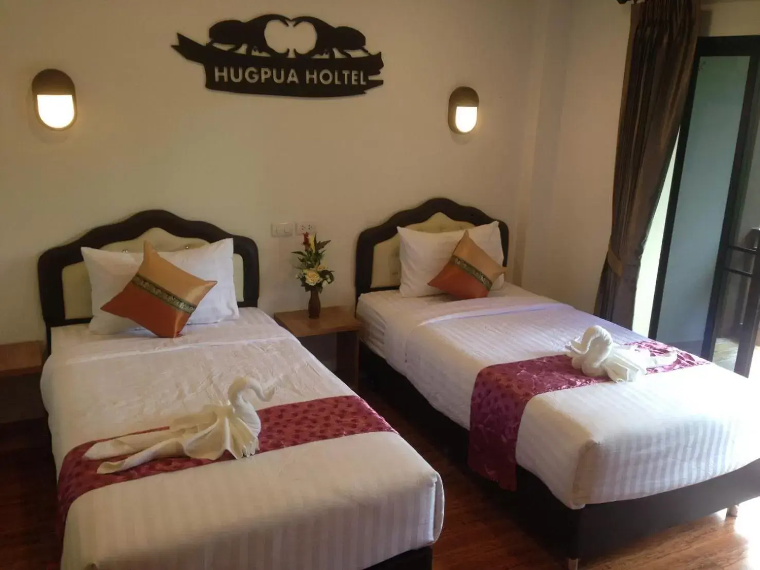 Bed in Hugpua Hotel