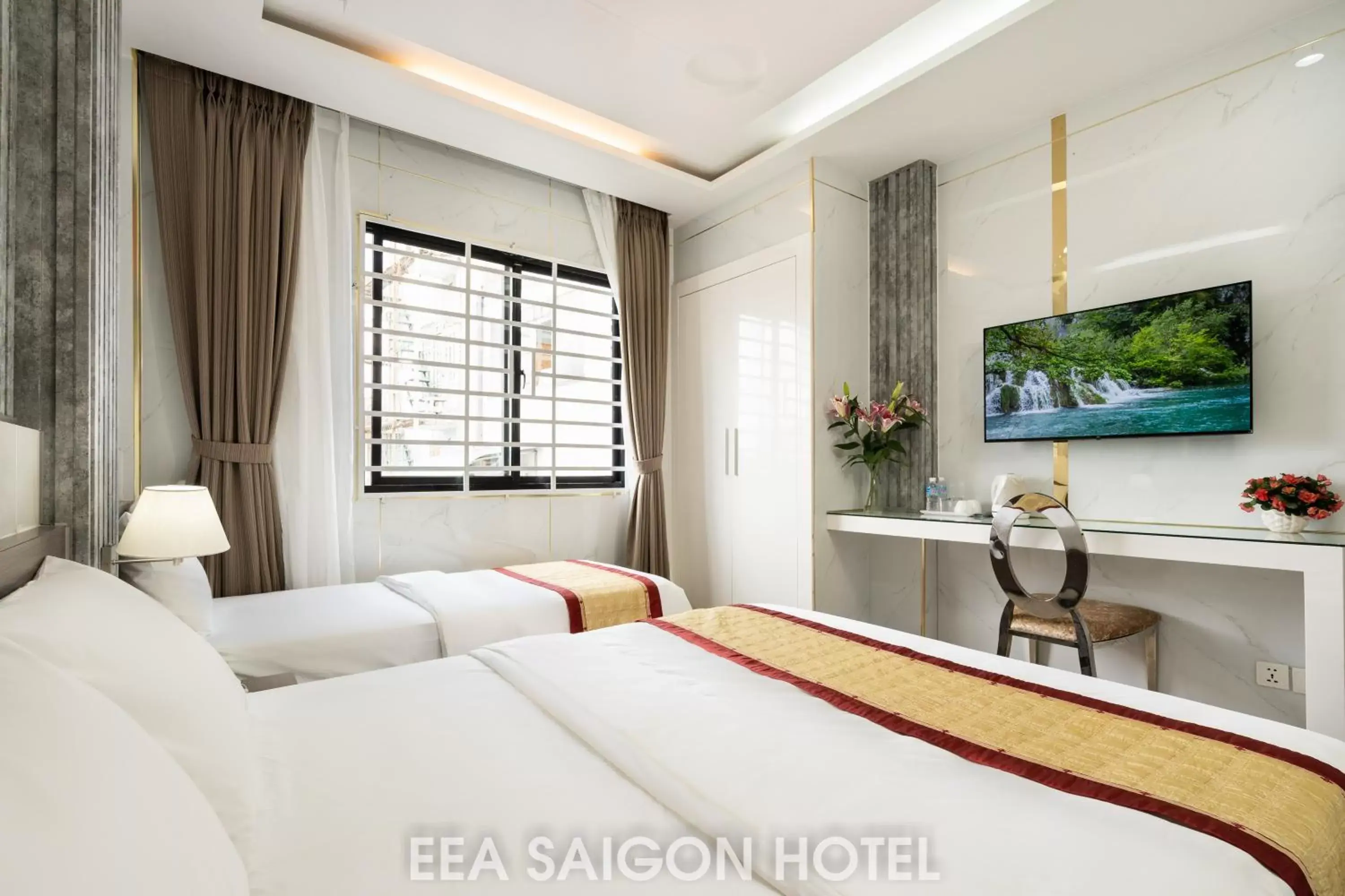 Bed in EEA Central Saigon Hotel