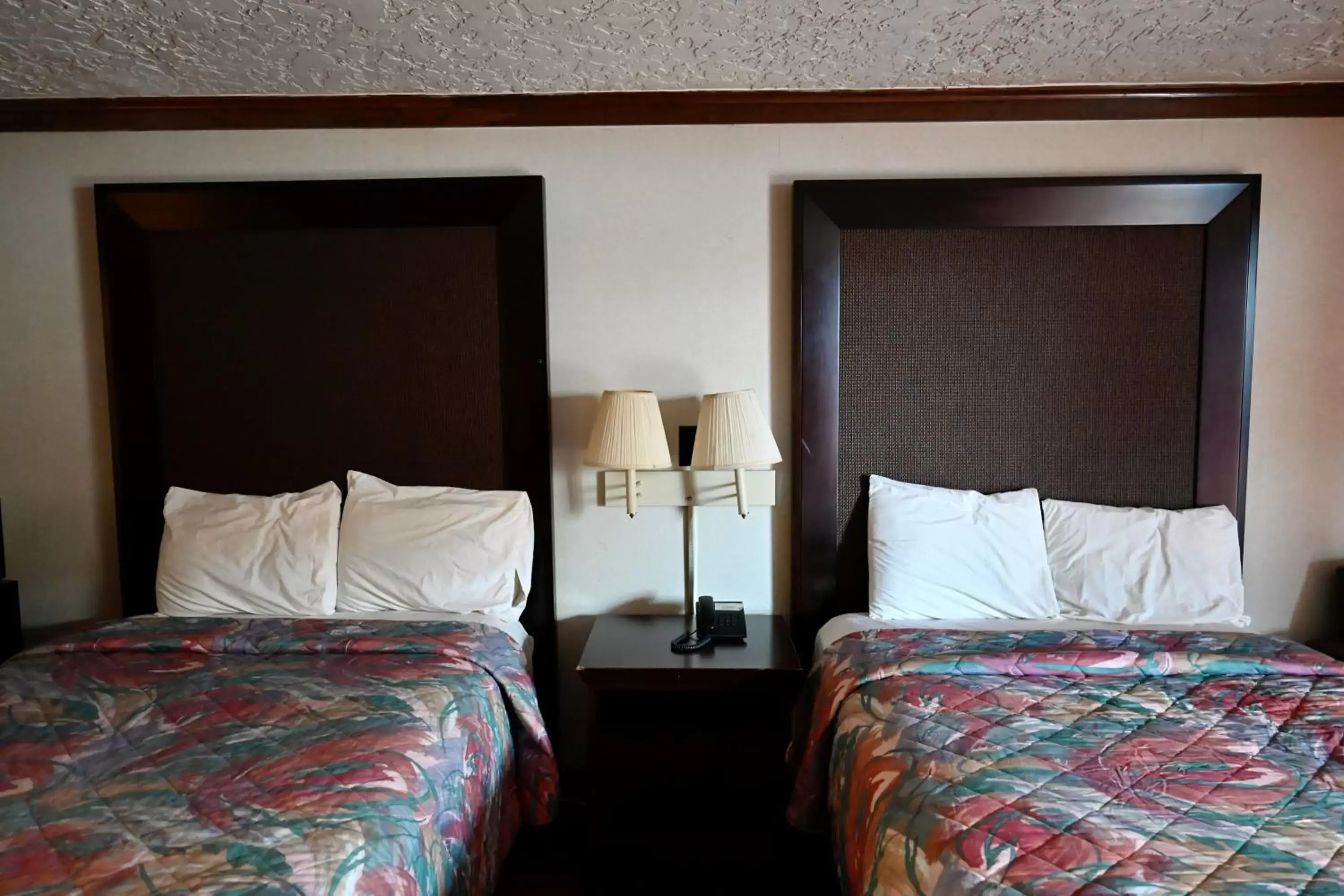 Bed in Rittiman Inn and Suites