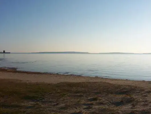 Area and facilities, Beach in Waterfront Inn Mackinaw City